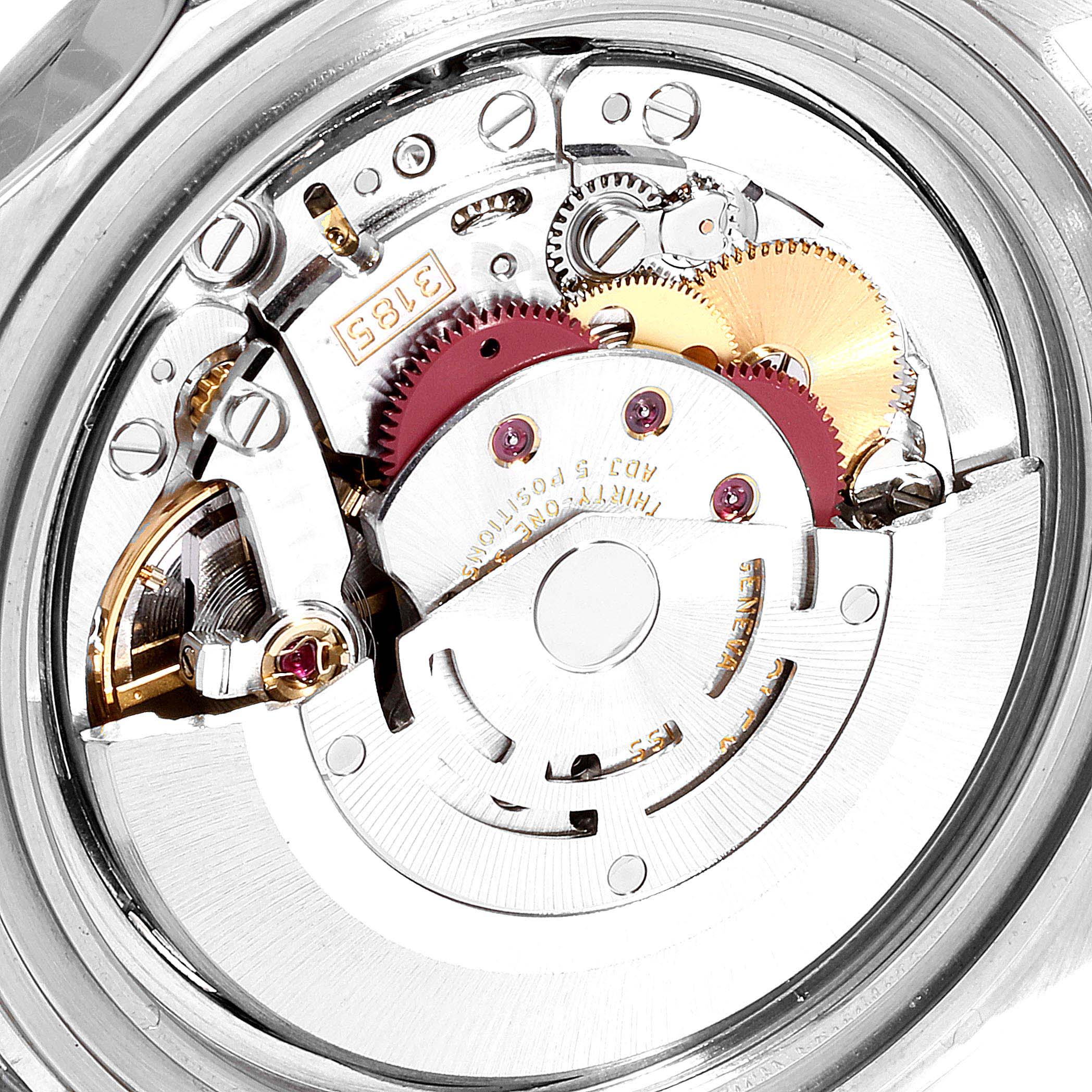 This image shows a close-up of the movement mechanism inside a Rolex Explorer 16570 Men
s Stainless Steel White Dial 16570 Men
s Stainless Steel White Dial model watch.