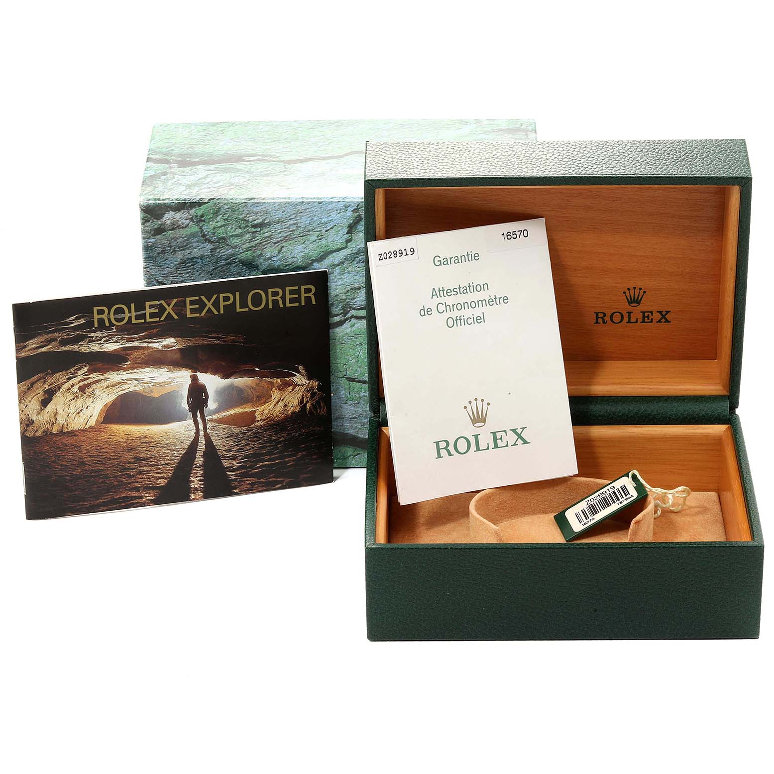 The image shows a Rolex Explorer 16570 Men
s Stainless Steel White Dial 16570 Men
s Stainless Steel White Dial watch box, warranty papers, and explorer booklet from a frontal angle.