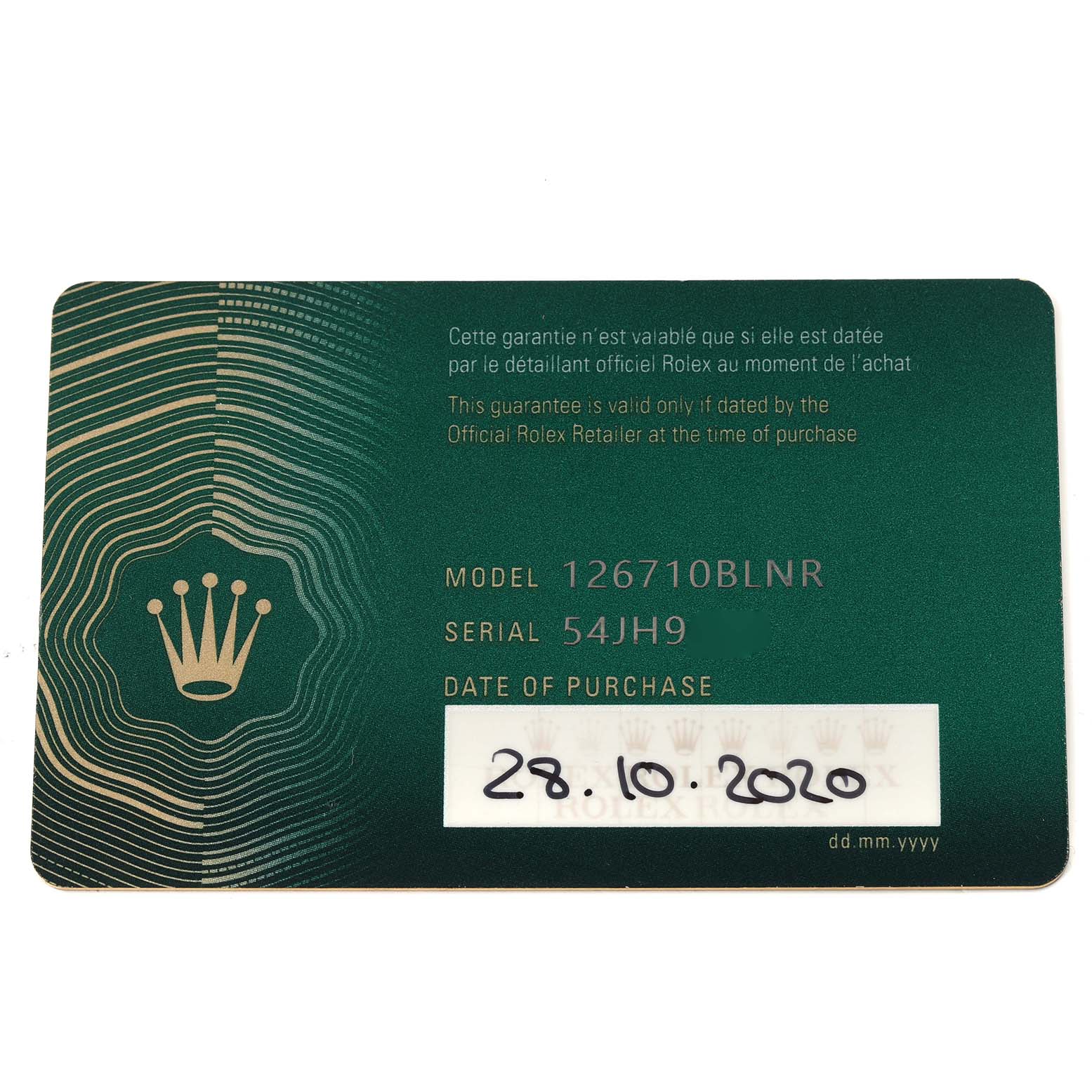 The image shows a green warranty card for a Rolex GMT-Master 126710 Men
s Stainless Steel Black Dial 126710 Men
s Stainless Steel Black Dial model 126710BLNR, displaying model, serial number, and purchase date.