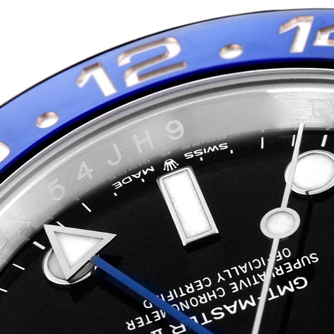 The image shows a close-up of the Rolex GMT-Master 126710 Men
s Stainless Steel Black Dial 126710 Men
s Stainless Steel Black Dial
s dial and blue bezel from an angled perspective.