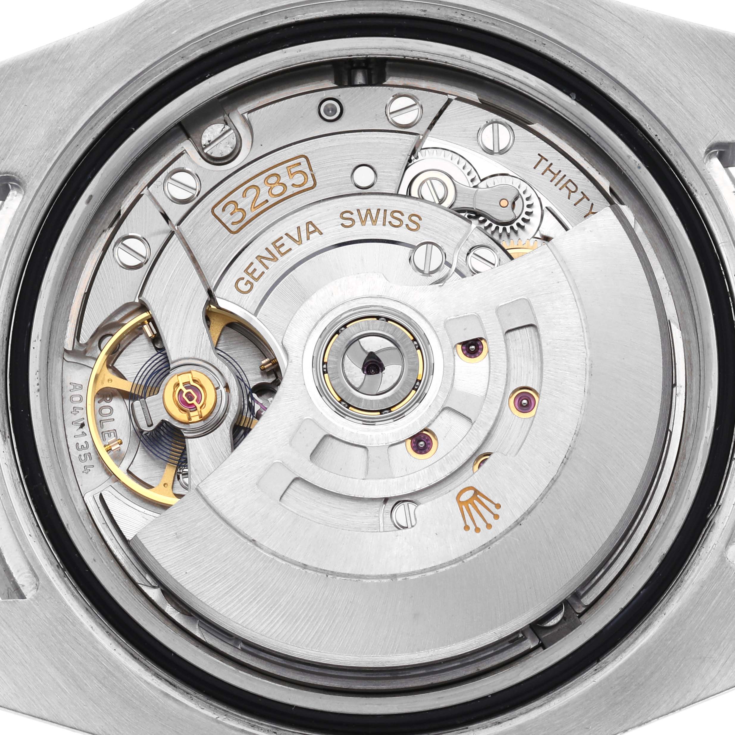 The image shows the movement of a Rolex GMT-Master 126710BLRO Men
s Stainless Steel Black Dial 126710BLRO Men
s Stainless Steel Black Dial, highlighting its intricate mechanical components from the back.