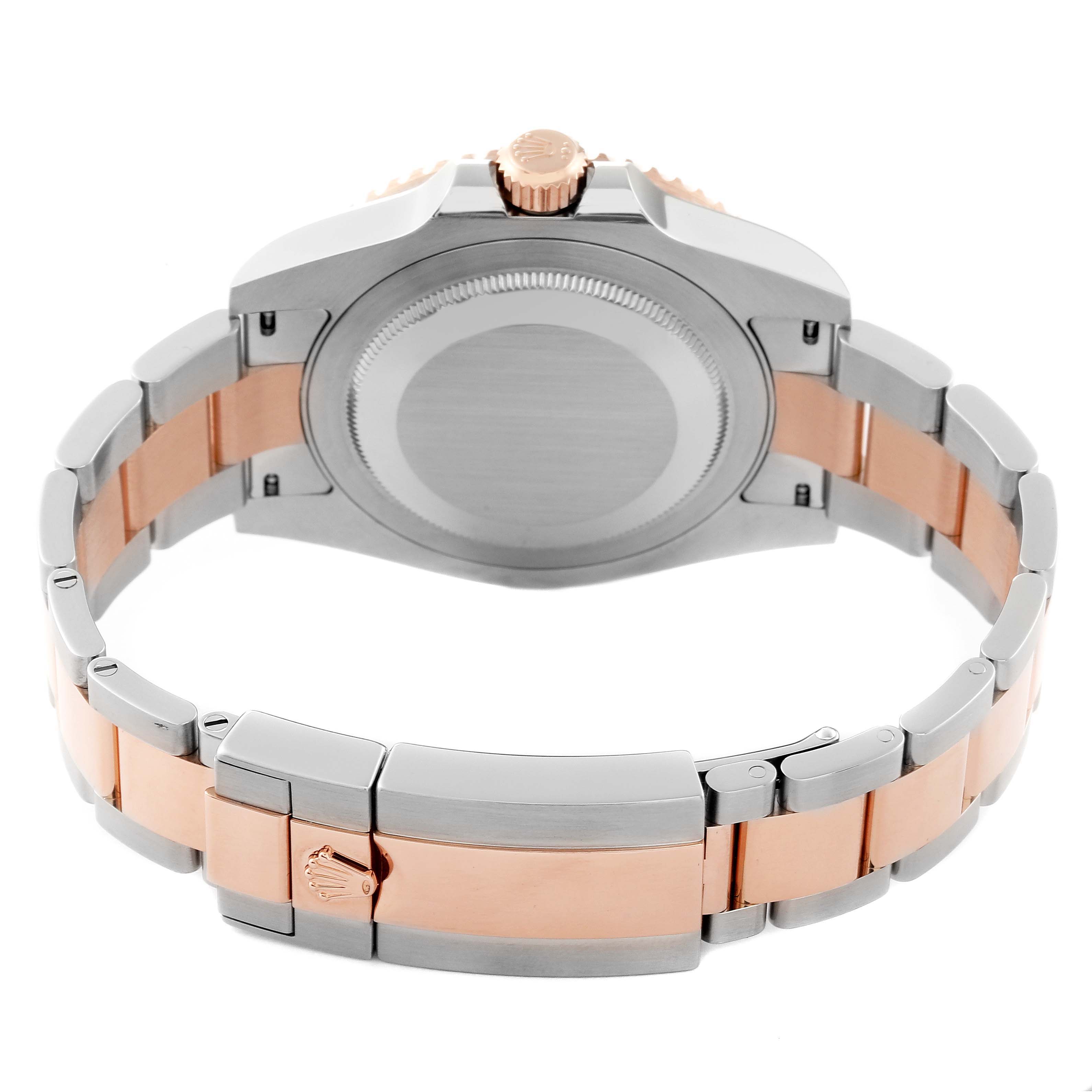 The image shows the back case and bracelet of a Rolex GMT-Master 126711CHNR Men's Steel and Gold (two tone) Black Dial 126711CHNR Men's Steel and Gold (two tone) Black Dial watch, displaying a mix of silver and rose gold tones.