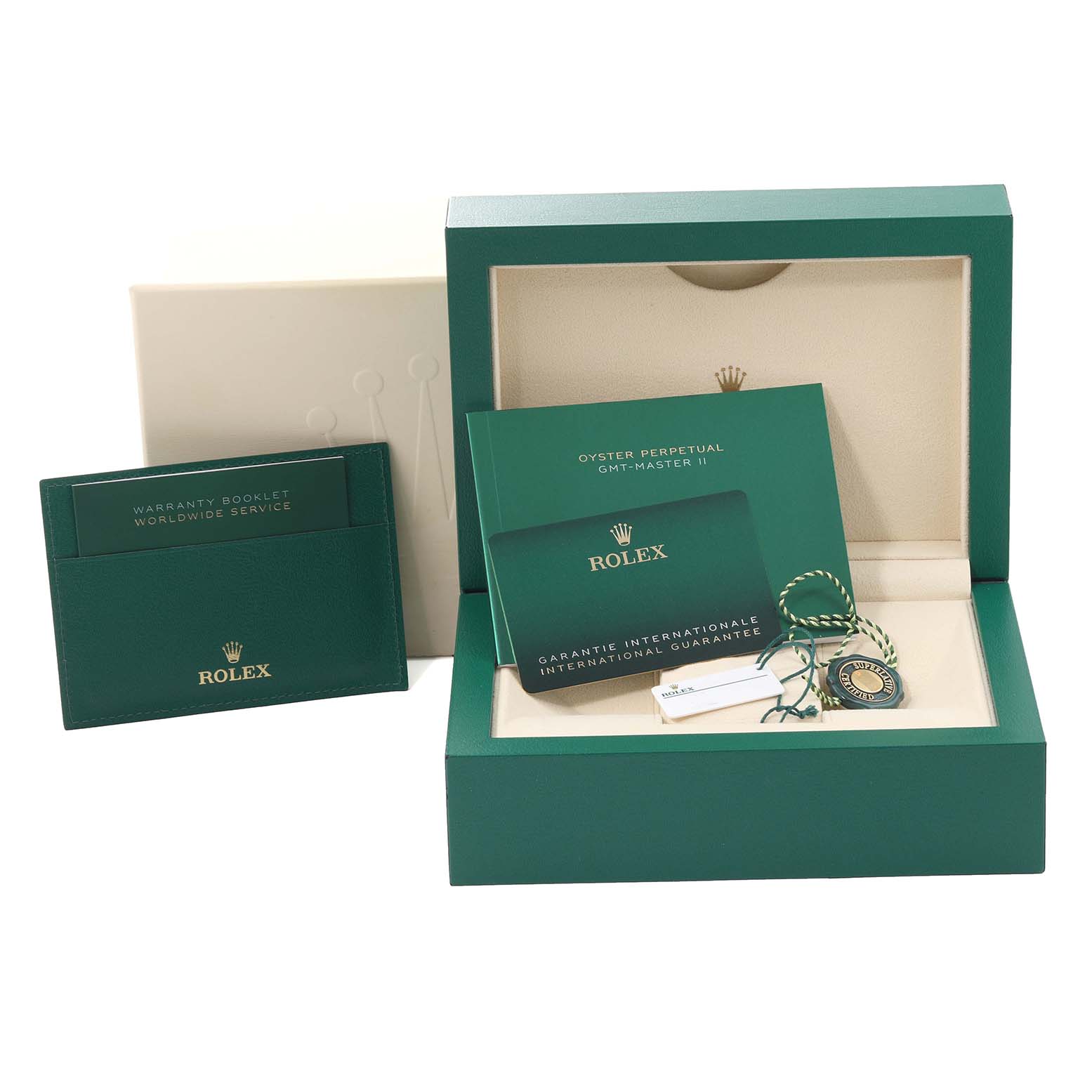 The image shows the packaging and accessories, including booklets and tags, for a Rolex GMT-Master 126720VTNR Men's Stainless Steel Black Dial 126720VTNR Men's Stainless Steel Black Dial II.