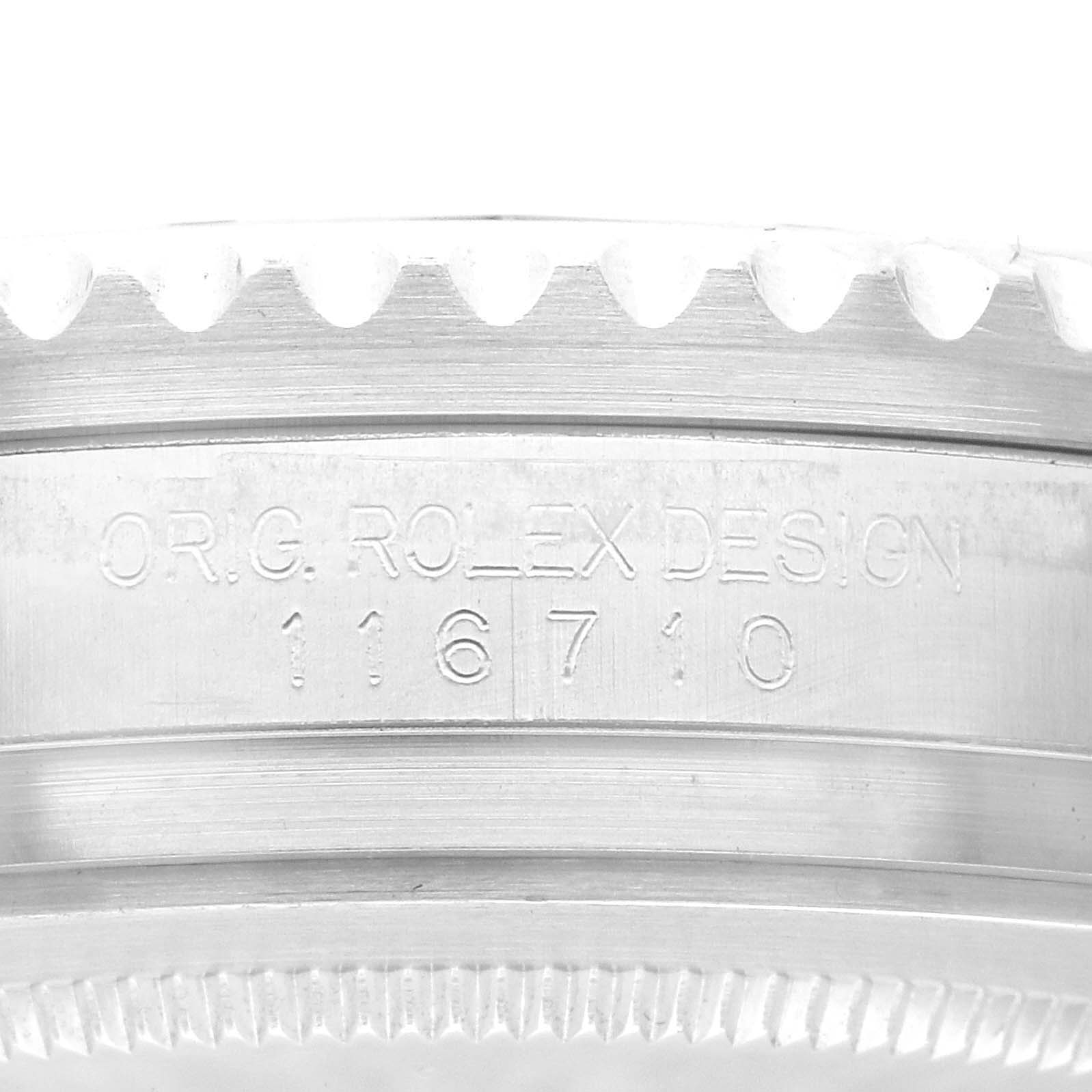 This image shows a close-up of the side of the case of a Rolex GMT-Master 116710 Men
s Stainless Steel Black Dial 116710 Men
s Stainless Steel Black Dial watch, highlighting the "OR.G. ROLEX DESIGN" and the model number "16710".