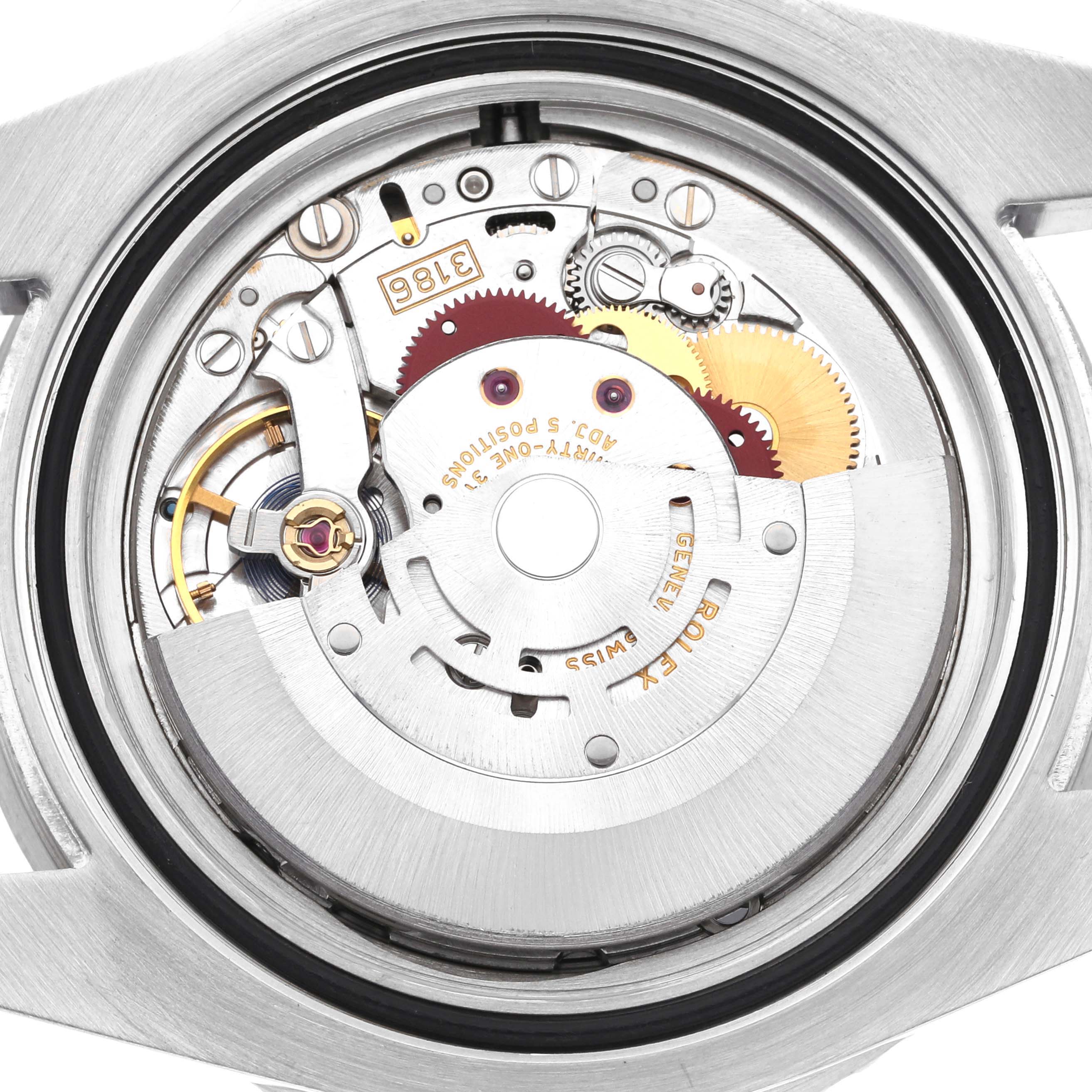 This is an interior view of the Rolex GMT-Master 116710 Men
s Stainless Steel Black Dial 116710 Men
s Stainless Steel Black Dial watch, showcasing its intricate movement and mechanical parts.