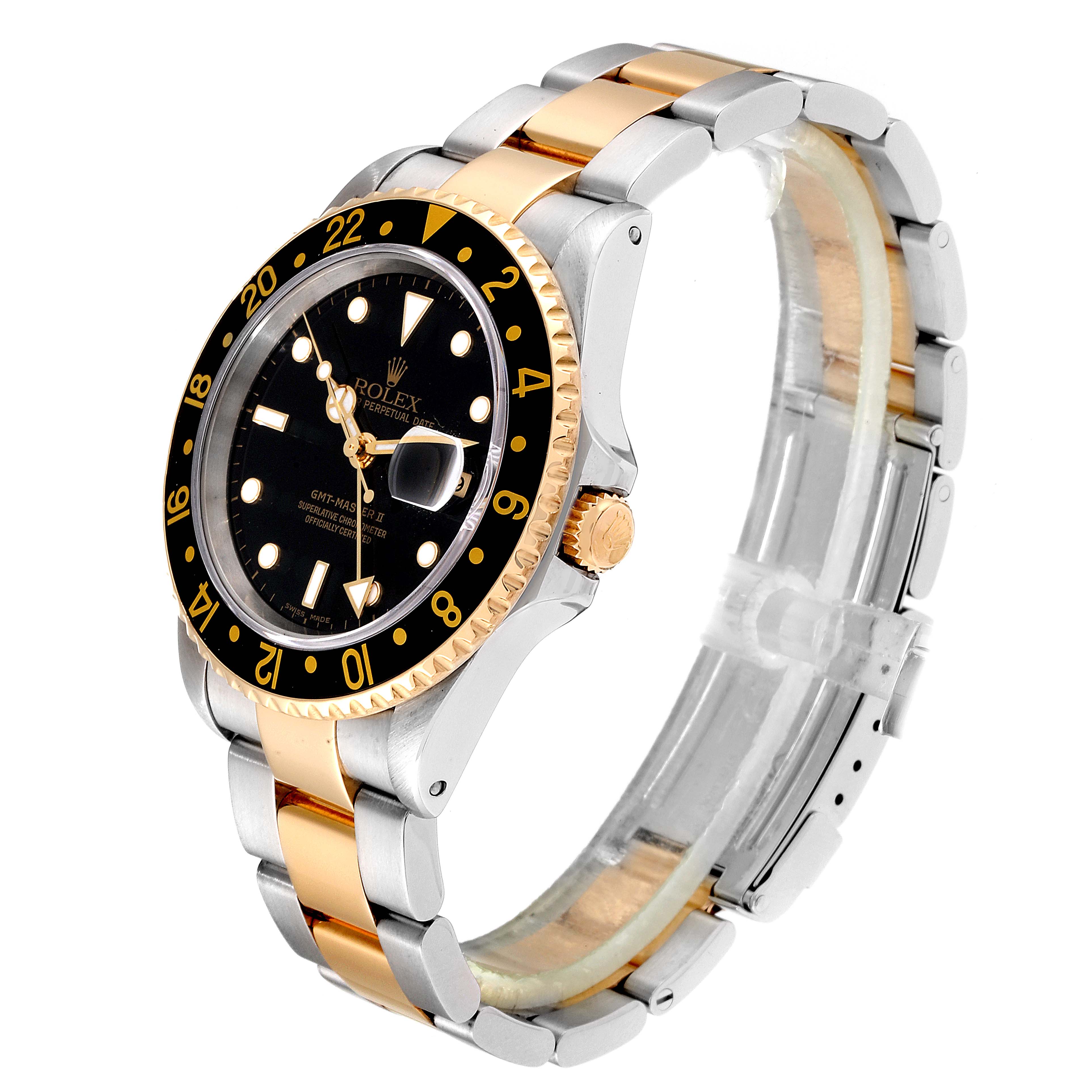 This Rolex GMT-Master 16713 Men
s Steel and Gold (two tone) Black Dial 16713 Men
s Steel and Gold (two tone) Black Dial watch is shown at a three-quarter angle, highlighting its bezel, dial, and two-tone bracelet.