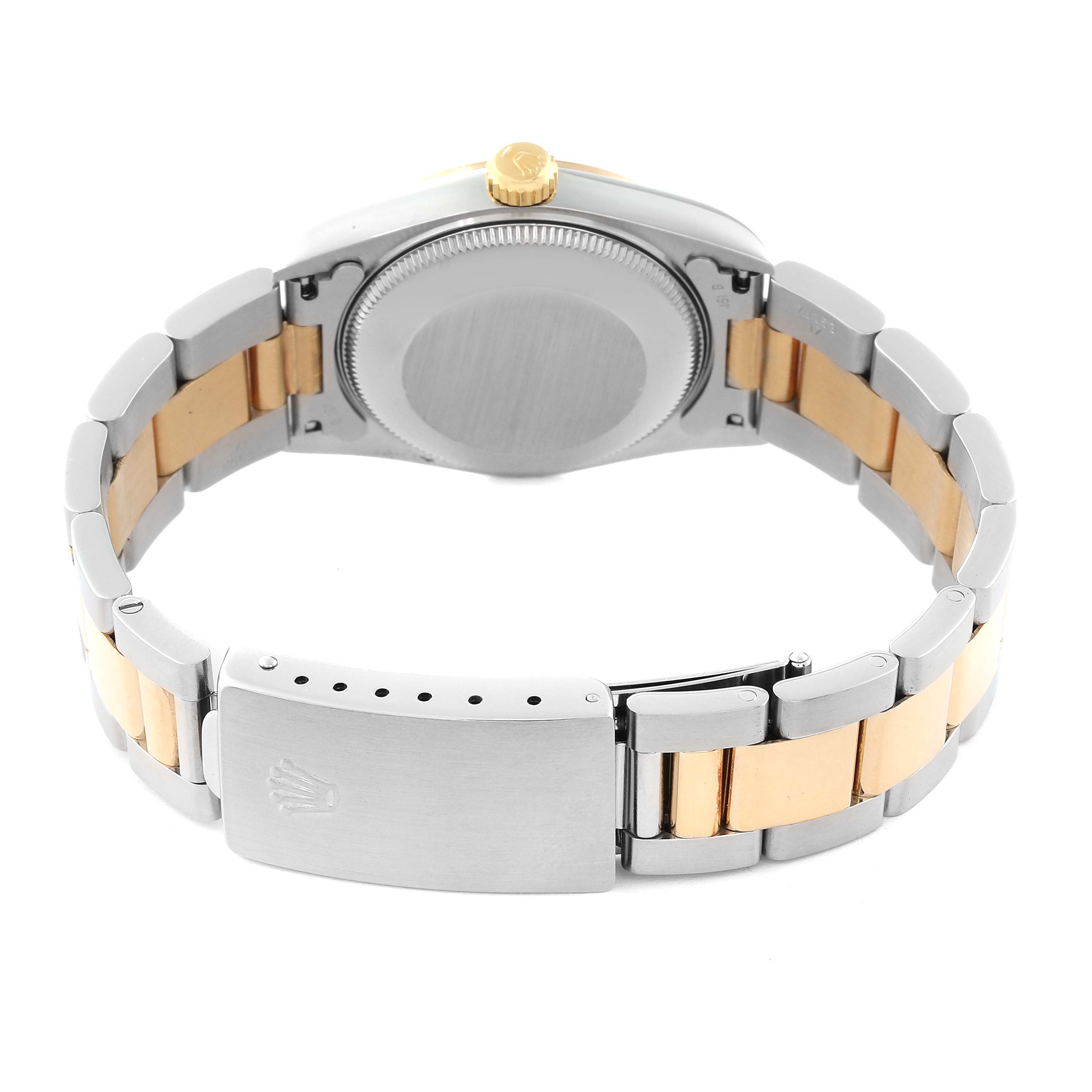 This image shows the back view of a Mid-Size Rolex watch, highlighting the case, crown, and bracelet clasp.