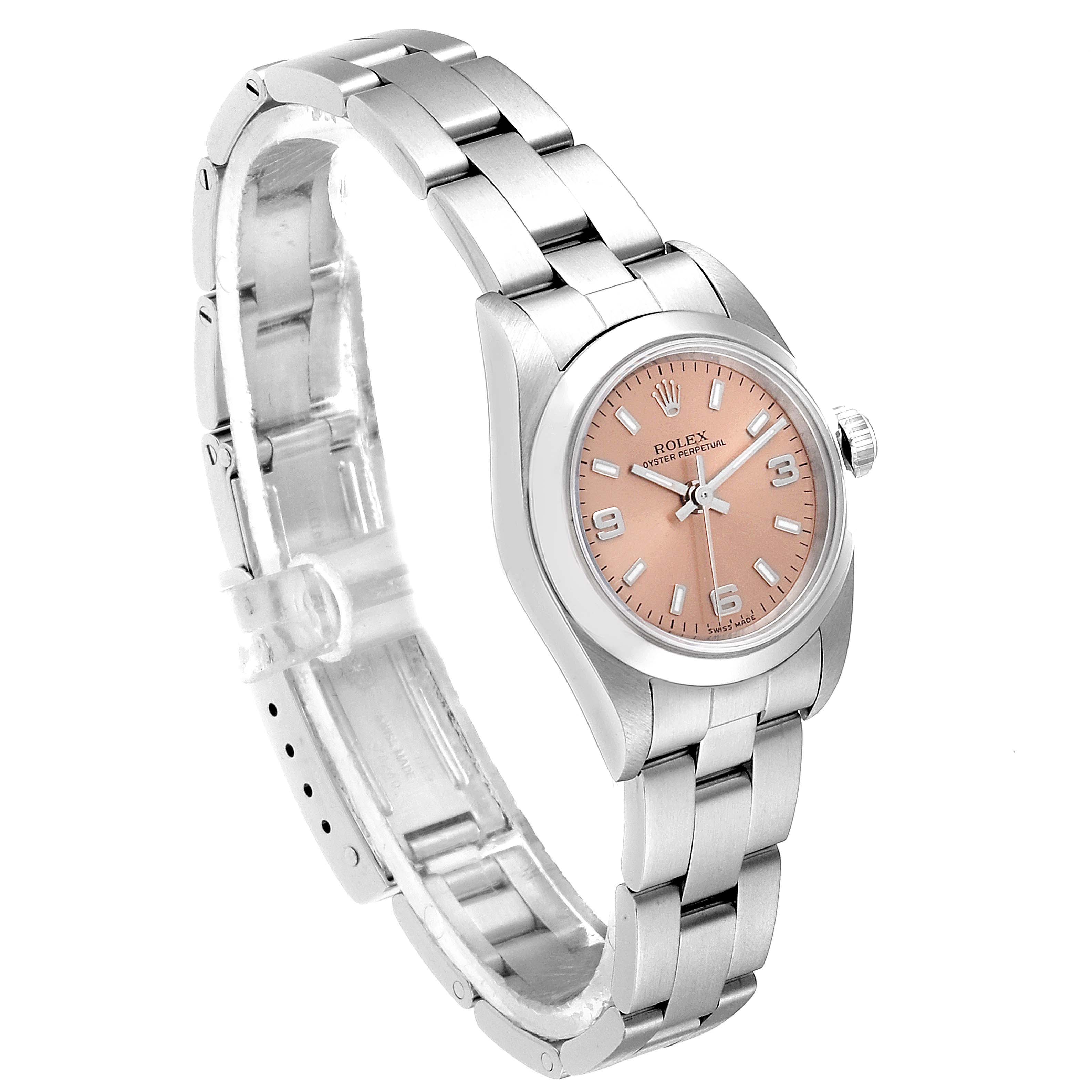 This image shows a Rolex Oyster Perpetual 76080 Women's Stainless Steel Pink Dial 76080 Women's Stainless Steel Pink Dial watch at a slight angle, highlighting its bracelet, case, and dial.