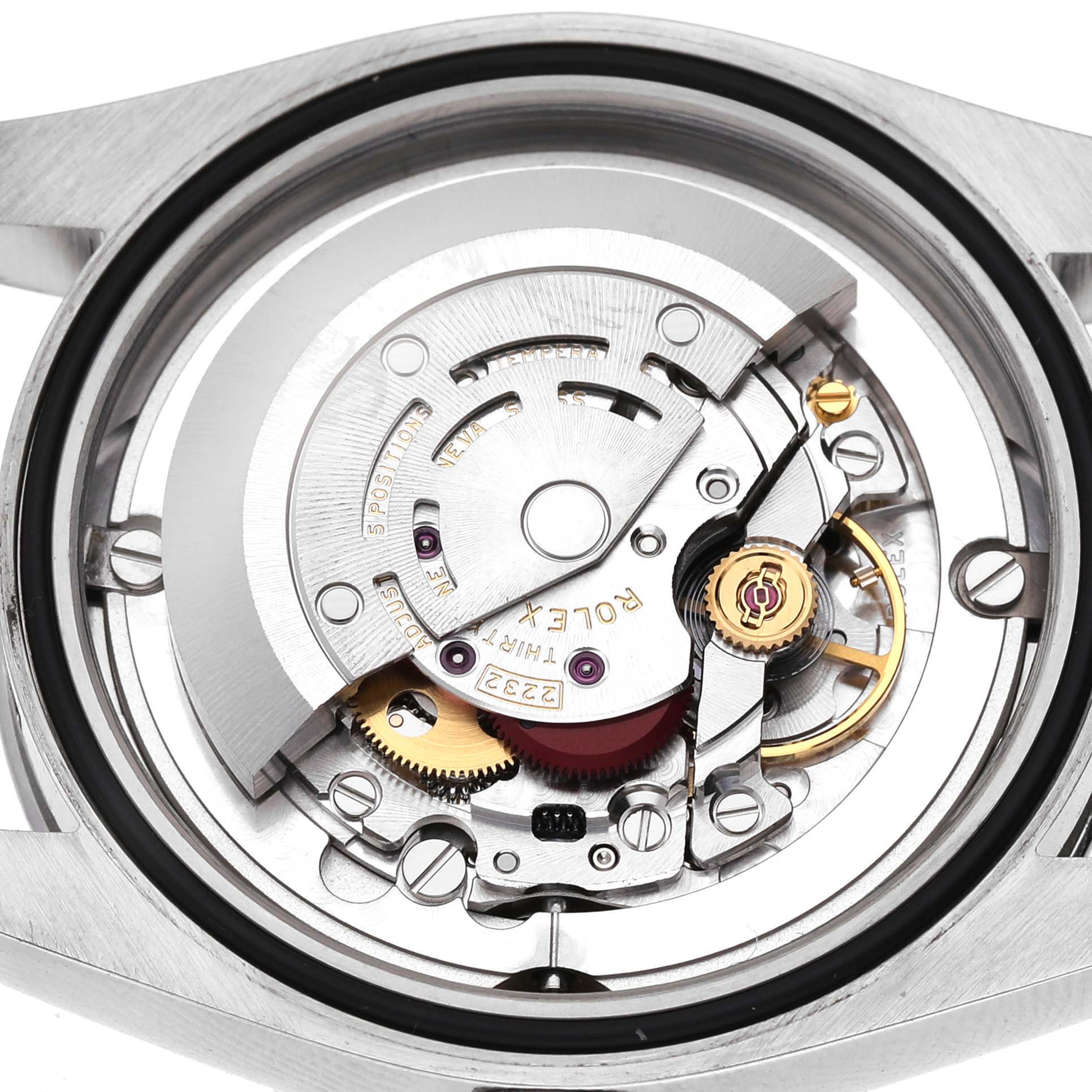 The image shows the movement of the Rolex Oyster Perpetual M124200-0003 Men's Stainless Steel Blue Dial watch from a top-down angle, highlighting its intricate gears and rotor.