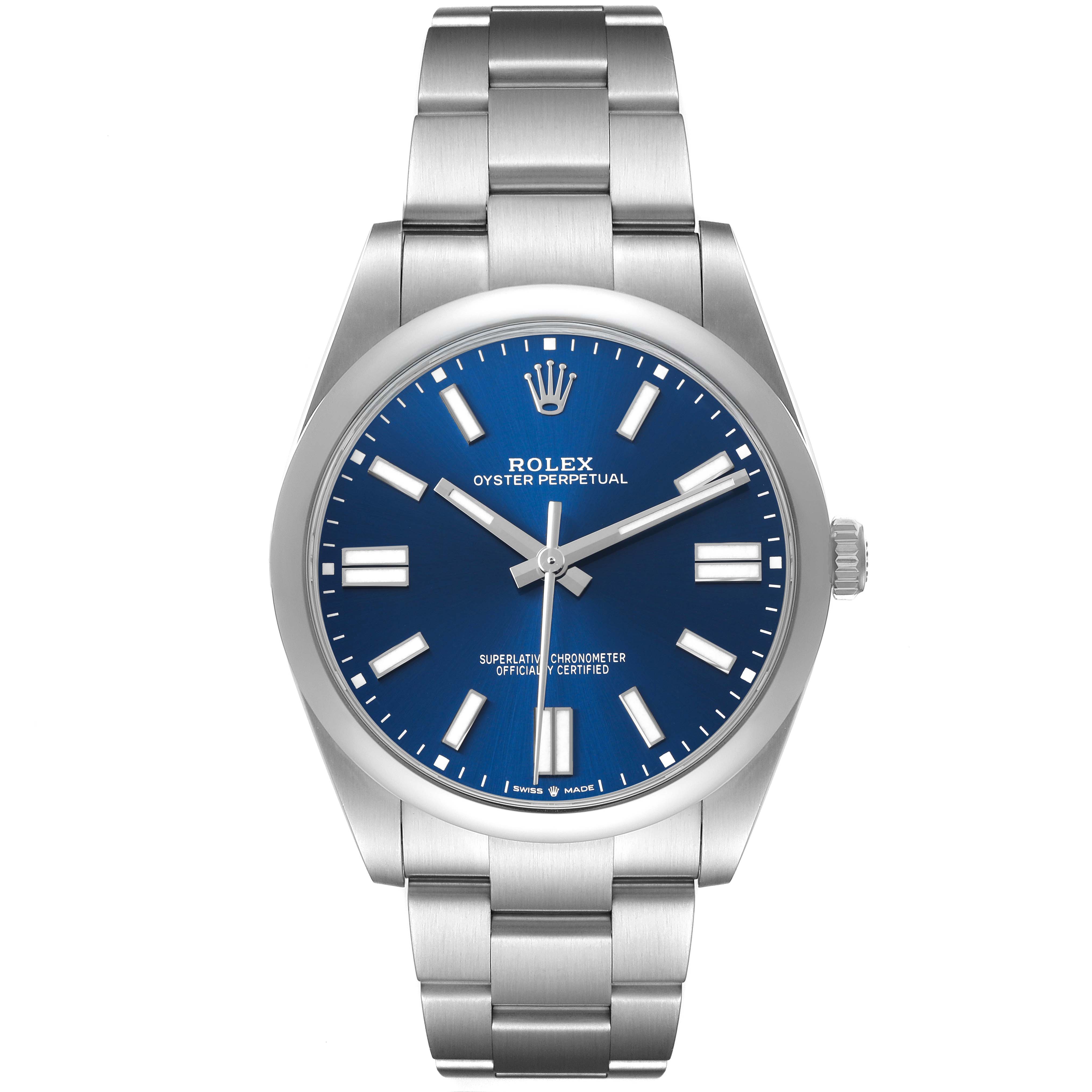 The Rolex Oyster Perpetual 124300 Men's Stainless Steel Blue Dial watch is shown from a straight-on angle, displaying its blue dial, silver hour markers, and metal bracelet.