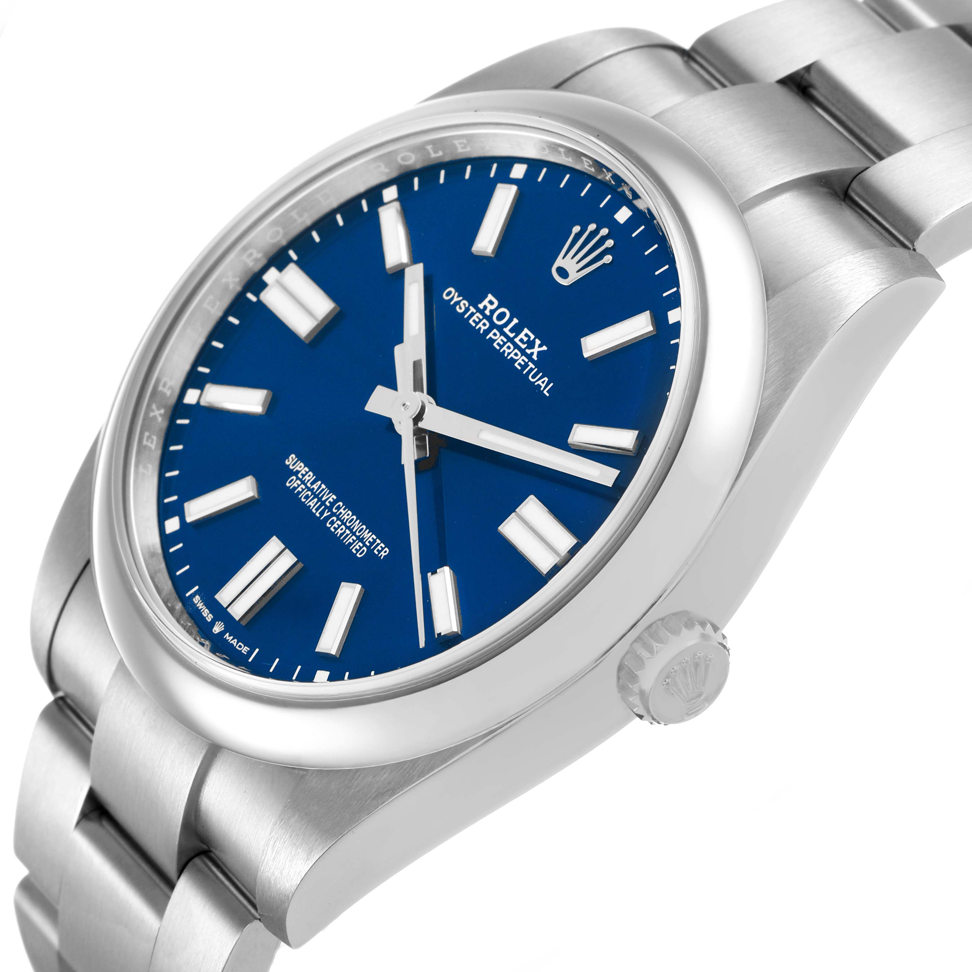 The Rolex Oyster Perpetual 124300 Men's Stainless Steel Blue Dial watch is shown at a slight angle, highlighting the blue dial, stainless steel case, crown, and bracelet.