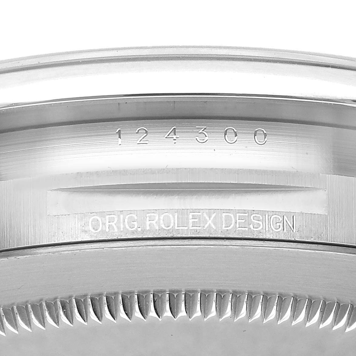 The image shows the side view of the Rolex Oyster Perpetual M124300-0005 Men's Stainless Steel Green Dial watch's case, displaying its model number and design engraving.