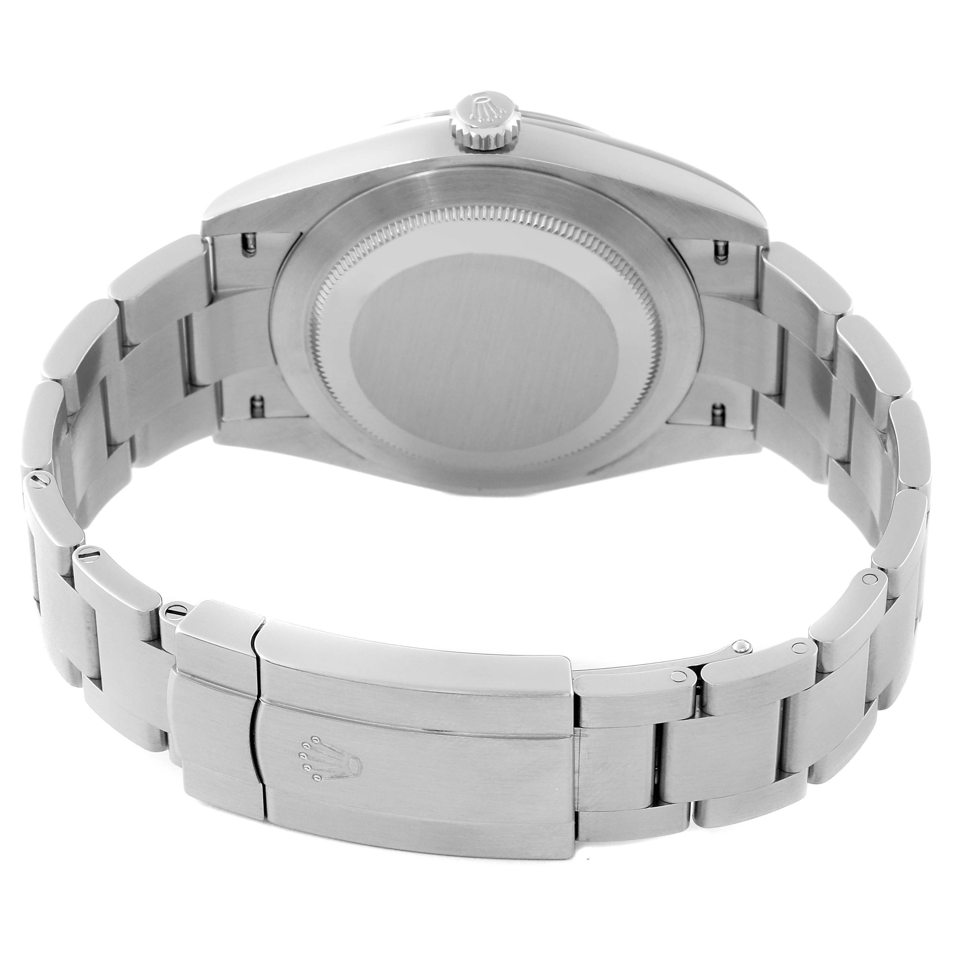The image shows the back and bracelet clasp of an Oyster Perpetual Rolex watch.