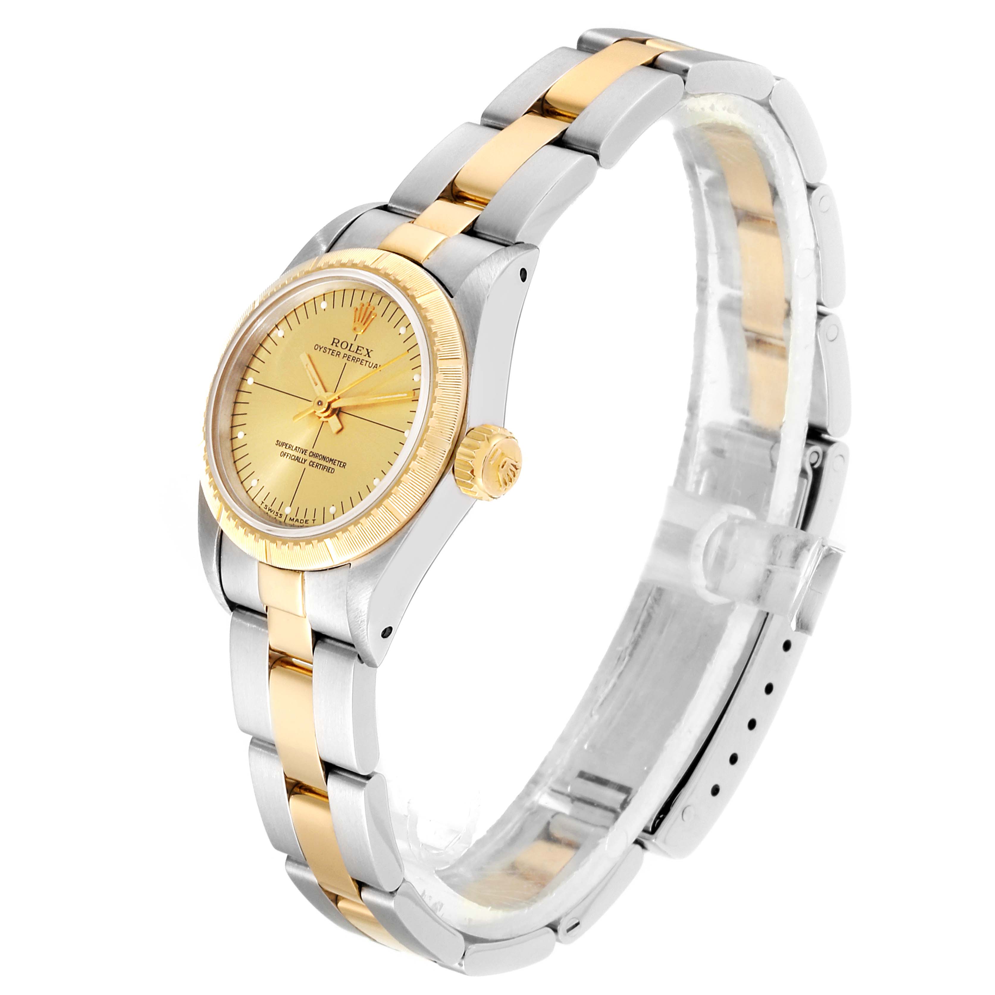 The image shows a side and front angle of the Rolex Oyster Perpetual 67243 Women
s Steel and Gold (two tone) Champagne Dial 67243 Women
s Steel and Gold (two tone) Champagne Dial watch, highlighting its dial, crown, and two-tone bracelet.