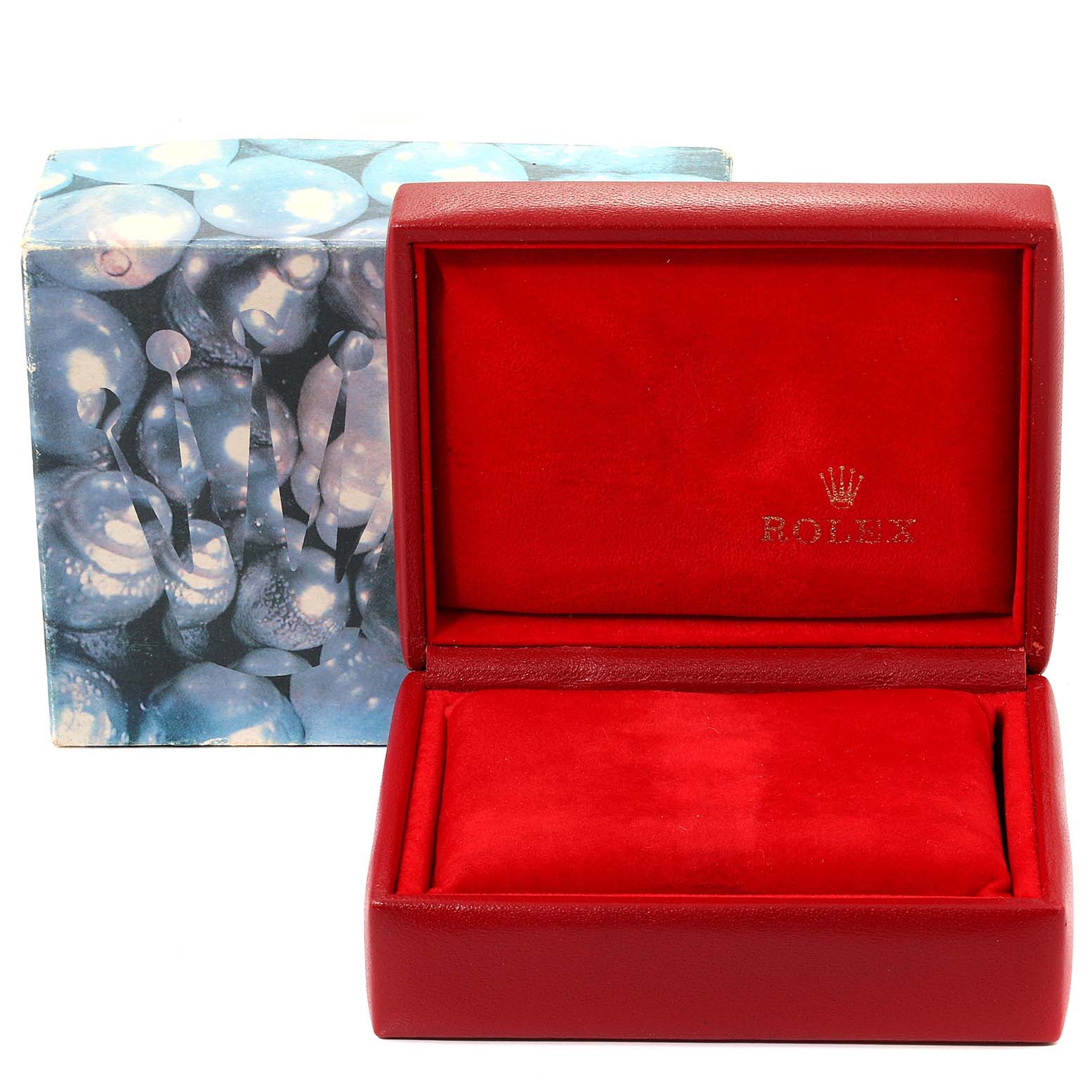 This is an image of a Rolex Oyster Perpetual 67243 Women
s Steel and Gold (two tone) Champagne Dial 67243 Women
s Steel and Gold (two tone) Champagne Dial watch box, open to show the interior red cushion.