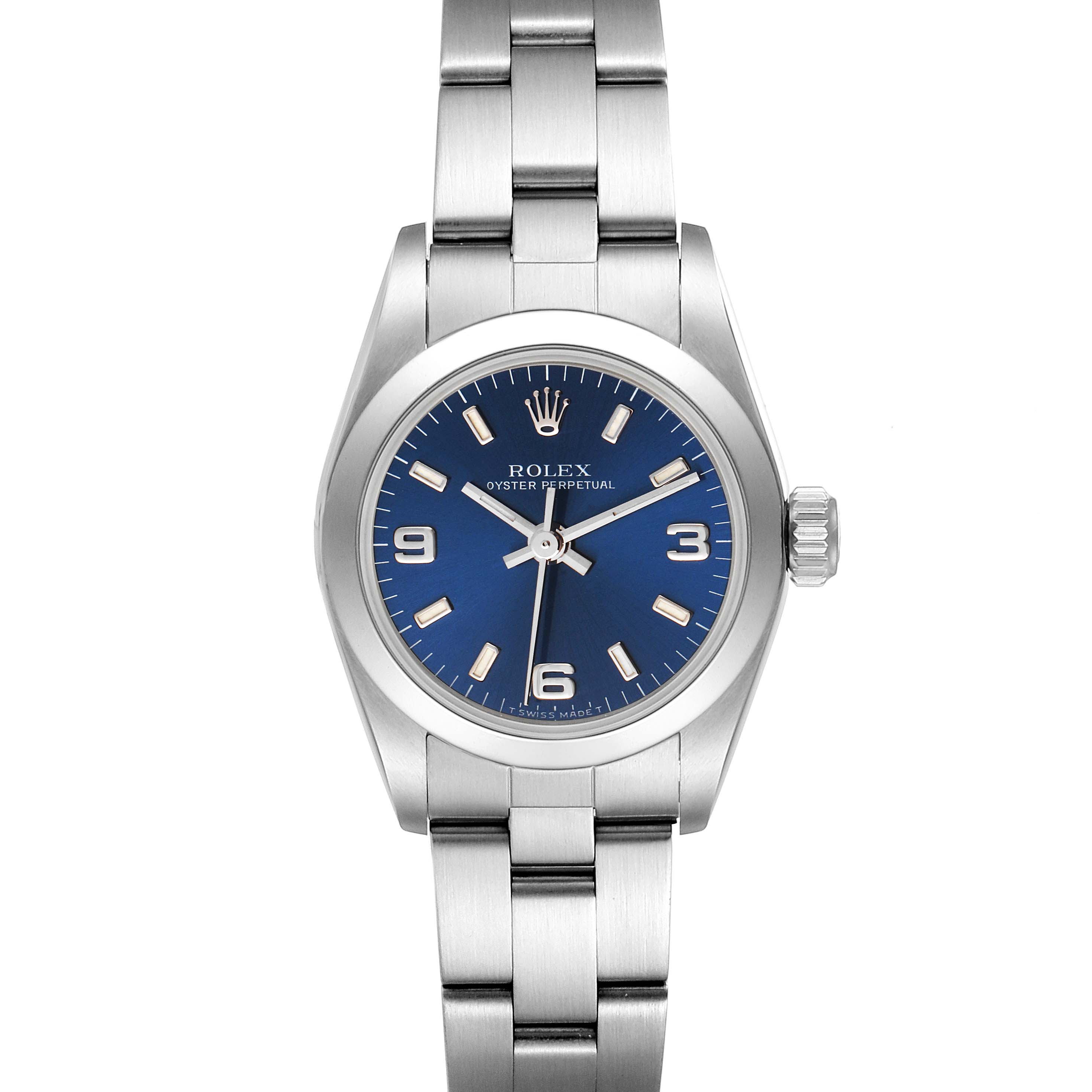 This is a front view of a Rolex Oyster Perpetual 67180 Women's Stainless Steel Blue Dial 67180 Women's Stainless Steel Blue Dial watch, showing the blue dial, hour markers, hands, crown, and stainless steel bracelet.