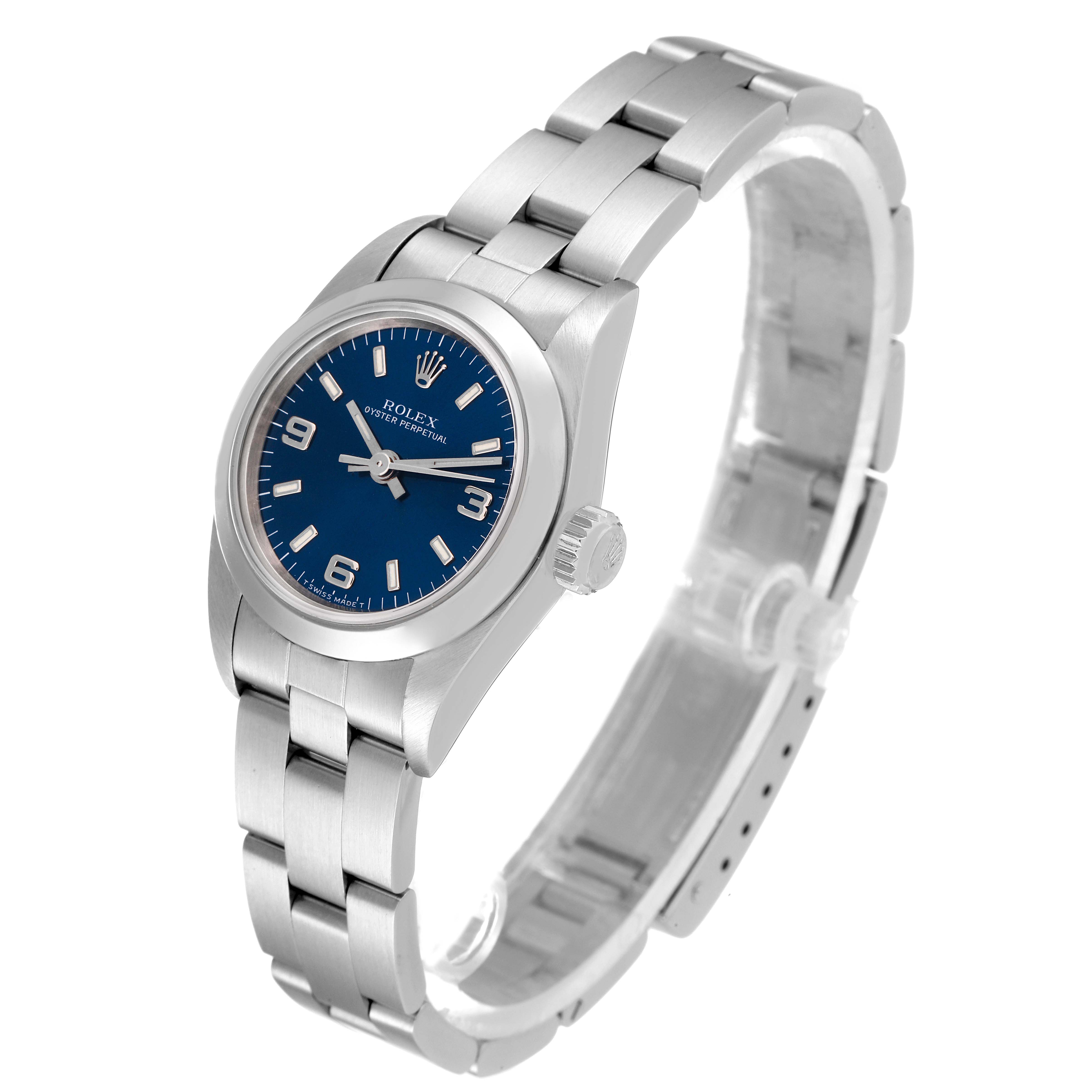 The image shows a Rolex Oyster Perpetual 67180 Women's Stainless Steel Blue Dial 67180 Women's Stainless Steel Blue Dial watch angled to display the face, bezel, bracelet, and crown.