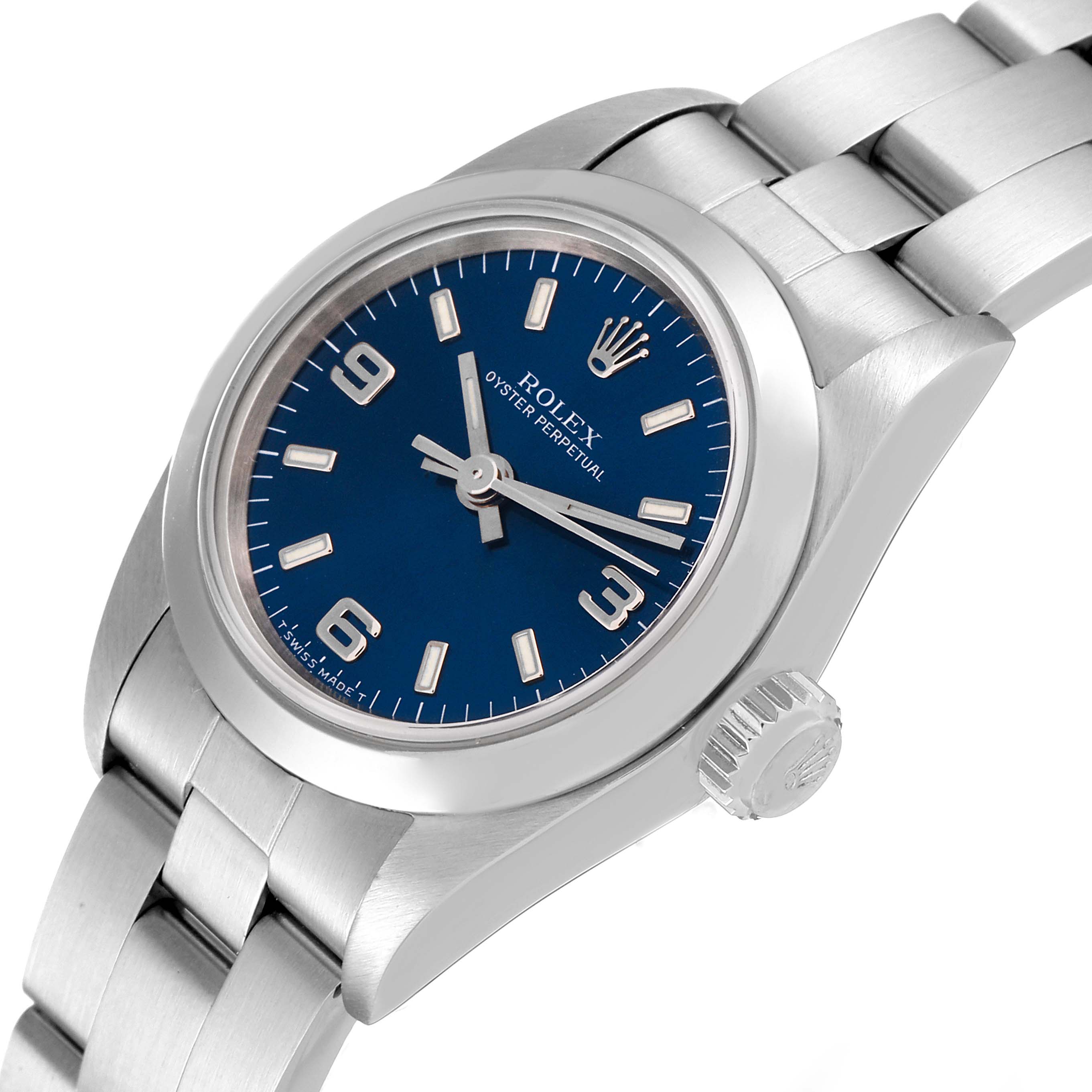 The image shows a Rolex Oyster Perpetual 67180 Women's Stainless Steel Blue Dial 67180 Women's Stainless Steel Blue Dial watch from an angled side view, highlighting the watch face, crown, and bracelet.