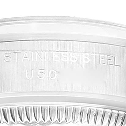 The image shows a close-up of the case back of a Rolex Oyster Perpetual 67180 Women's Stainless Steel Blue Dial 67180 Women's Stainless Steel Blue Dial watch, focusing on the stainless steel engravings.