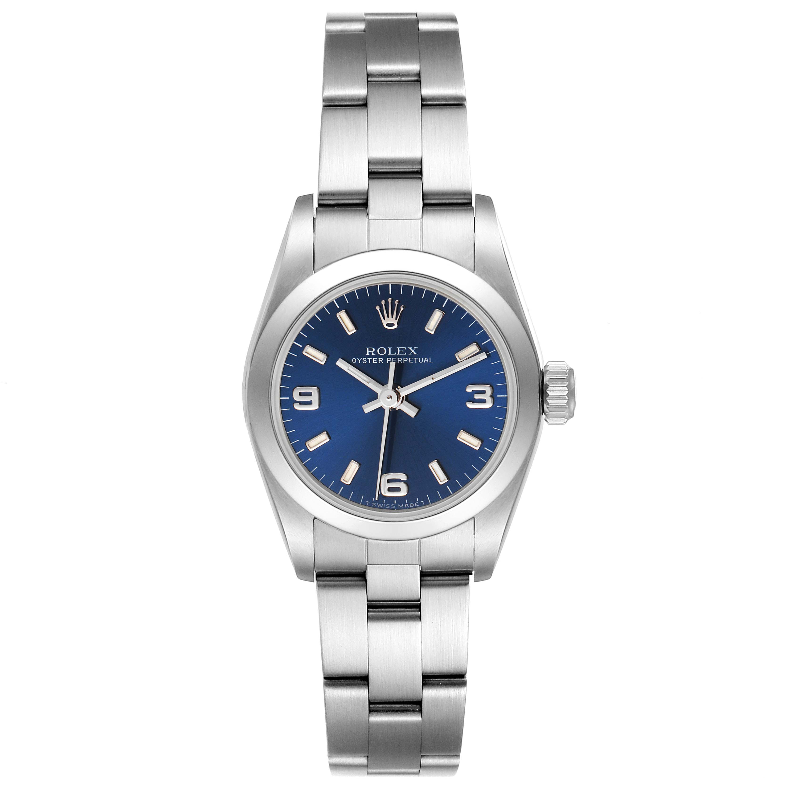 The image shows a Rolex Oyster Perpetual 67180 Women's Stainless Steel Blue Dial 67180 Women's Stainless Steel Blue Dial watch in a straight-on angle, highlighting the blue dial, bezel, and bracelet.