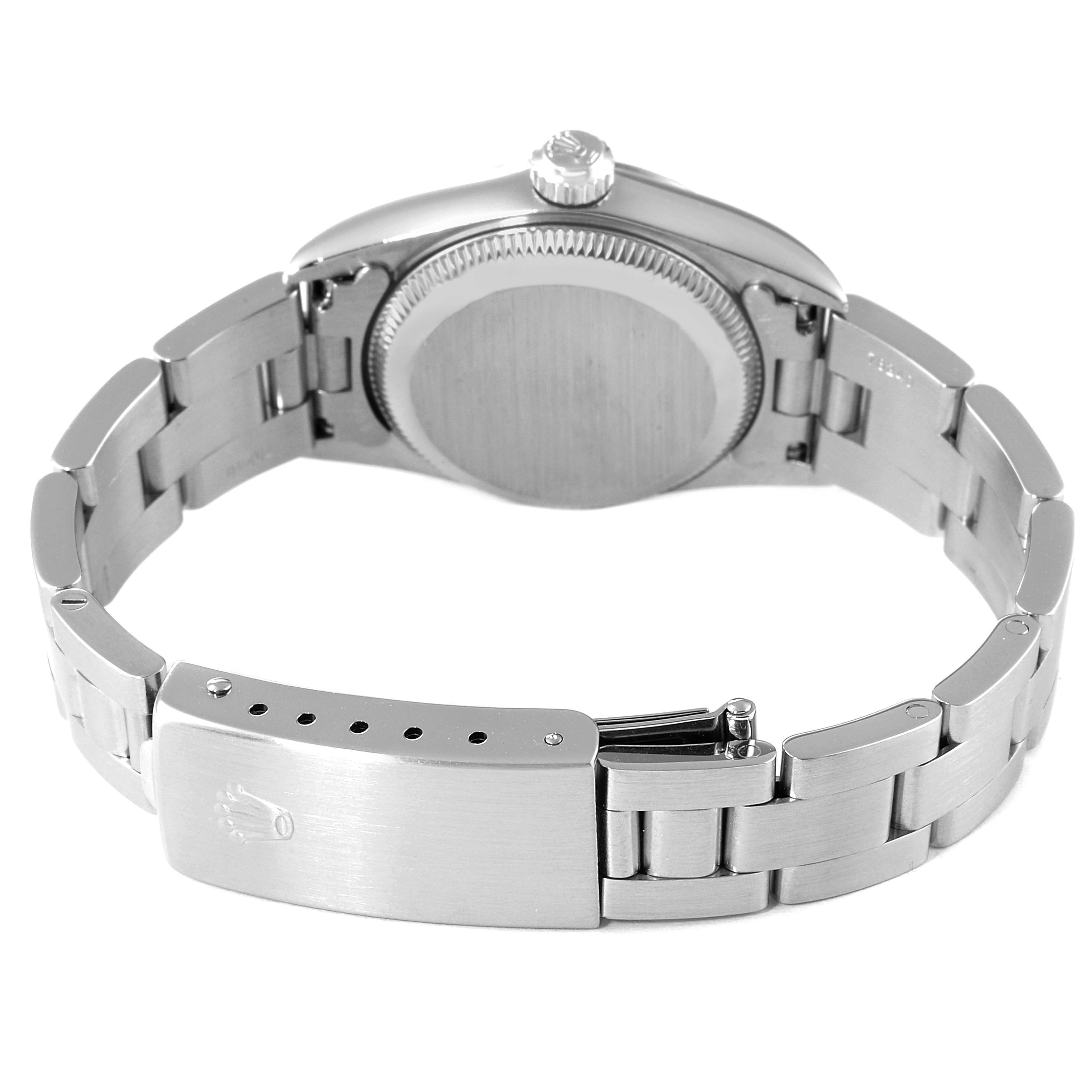 The image shows the back and clasp of a Rolex Oyster Perpetual 76030 Women
s Stainless Steel Pink Dial 76030 Women
s Stainless Steel Pink Dial watch from a rear angle.