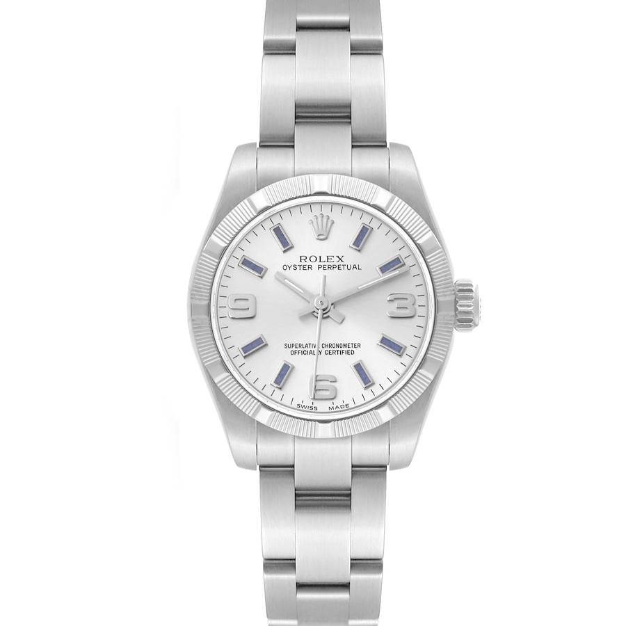 The Rolex Oyster Perpetual watch is shown from a top-down angle, displaying the dial, bezel, and bracelet.