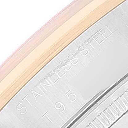 This close-up image shows part of the bezel and case of a Rolex Oyster Perpetual 14203 Men's Steel and Gold (two tone) Silver Dial 14203 Men's Steel and Gold (two tone) Silver Dial watch, highlighting the "Stainless Steel" engraving.