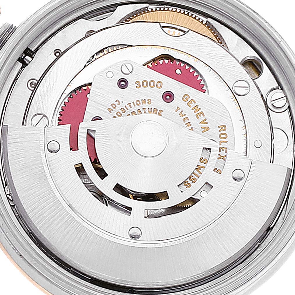 This image shows the internal movement parts of the Rolex Oyster Perpetual 14203 Men's Steel and Gold (two tone) Silver Dial 14203 Men's Steel and Gold (two tone) Silver Dial watch from a top-down angle.