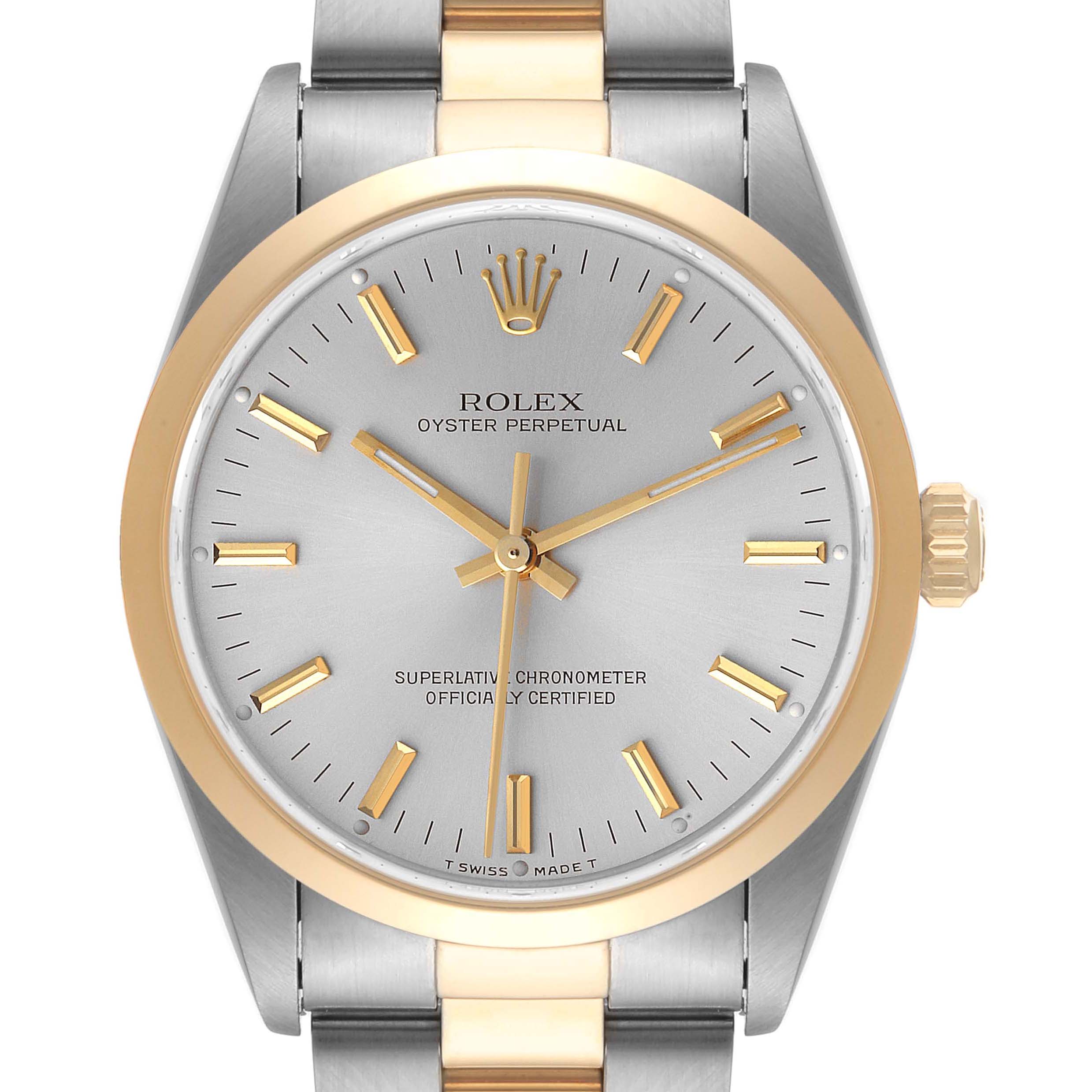 This image shows a front view of the Rolex Oyster Perpetual 14203 Men's Steel and Gold (two tone) Silver Dial 14203 Men's Steel and Gold (two tone) Silver Dial watch, highlighting its face, bezel, and part of the bracelet.