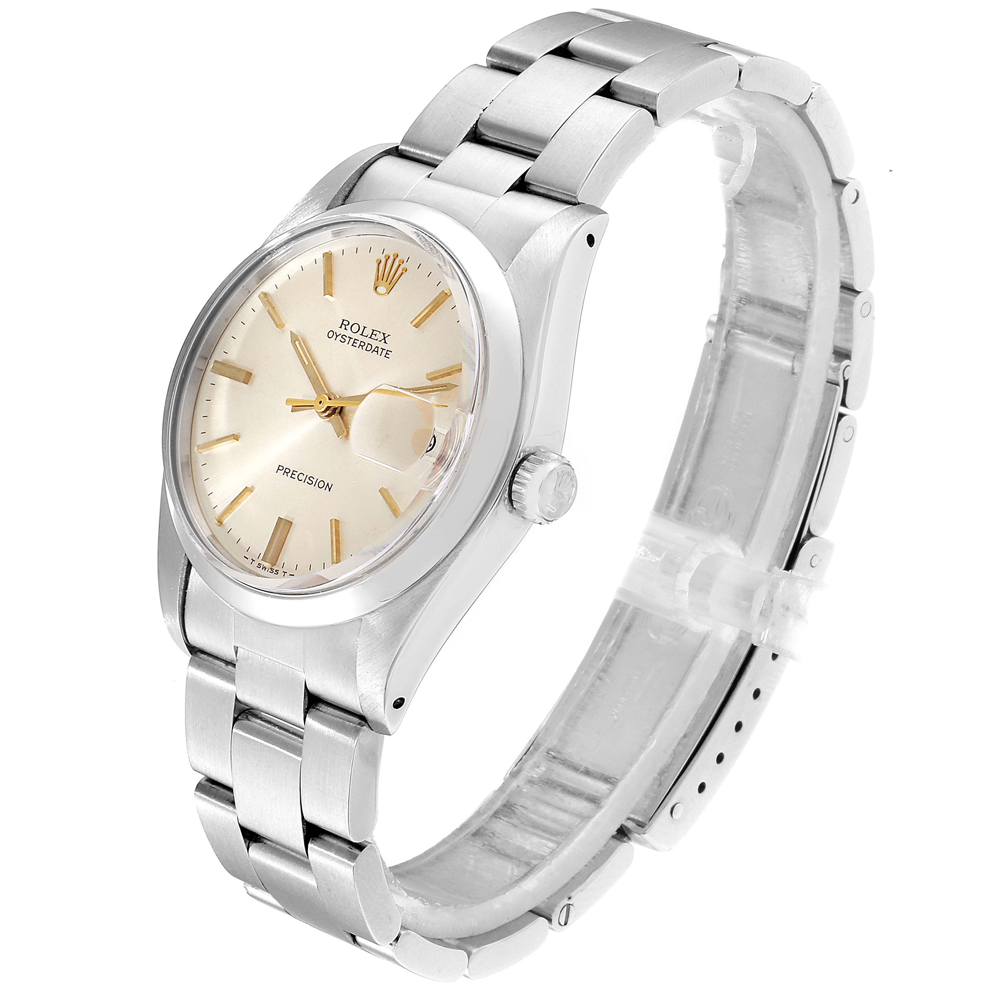 The image shows a Rolex Vintage Collection 6694 Men
s Stainless Steel Silver Dial 6694 Men
s Stainless Steel Silver Dial Oysterdate watch from a three-quarter angle, displaying the face, bezel, crown, and bracelet.