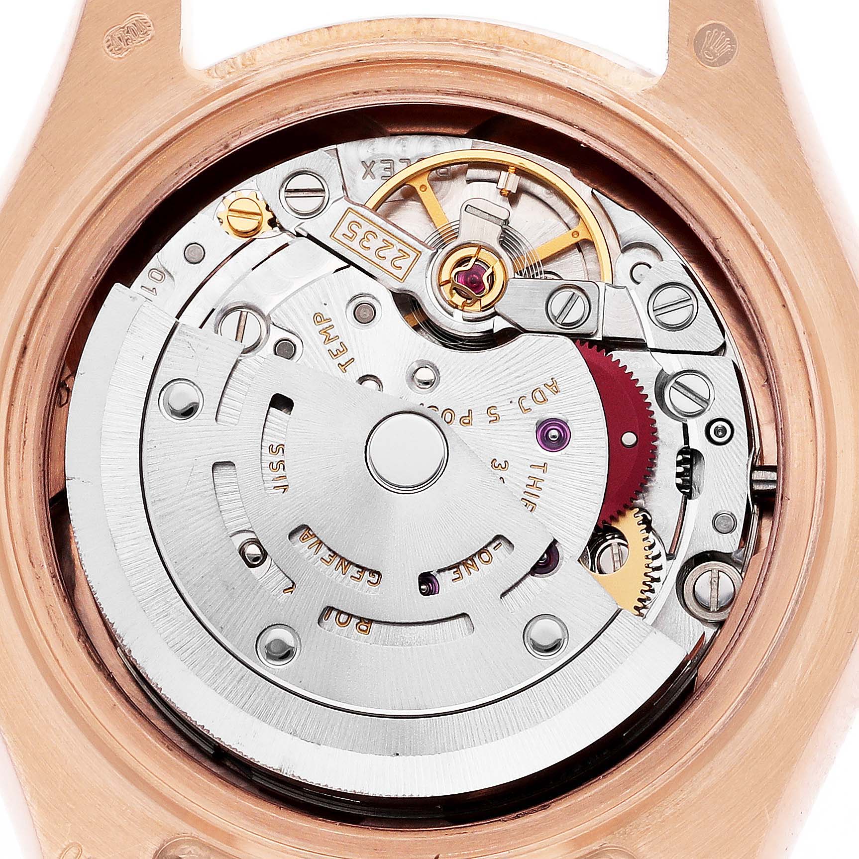 The image shows the intricate movement mechanism of a Rolex Pearlmaster 80285 Women
s Rose Gold Pink Dial 80285 Women
s Rose Gold Pink Dial watch from a top-down angle.