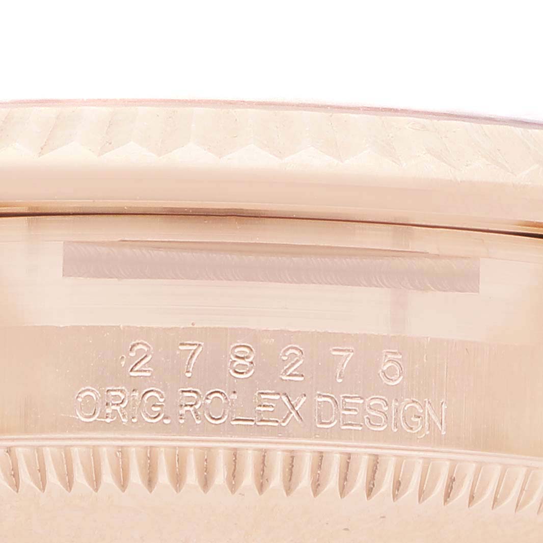 The image shows a close-up of the side of a Rolex Mid-Size 278275 Women's Rose Gold Pink Dial watch case, highlighting the engraved reference number.