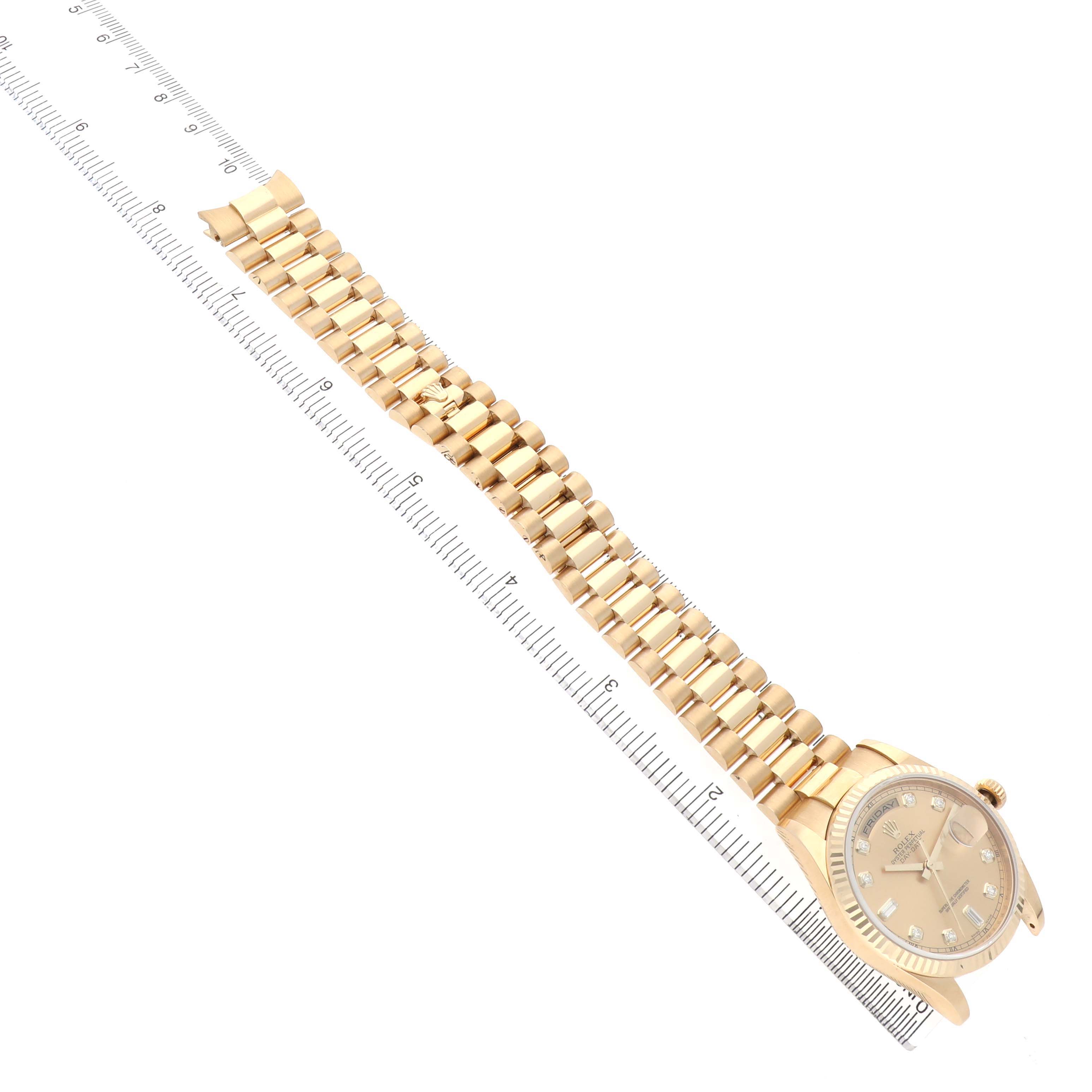 The Rolex President 118238 Men's Yellow Gold Champagne Dial watch is shown at a slight diagonal with the full bracelet and dial visible, alongside a ruler for scale.