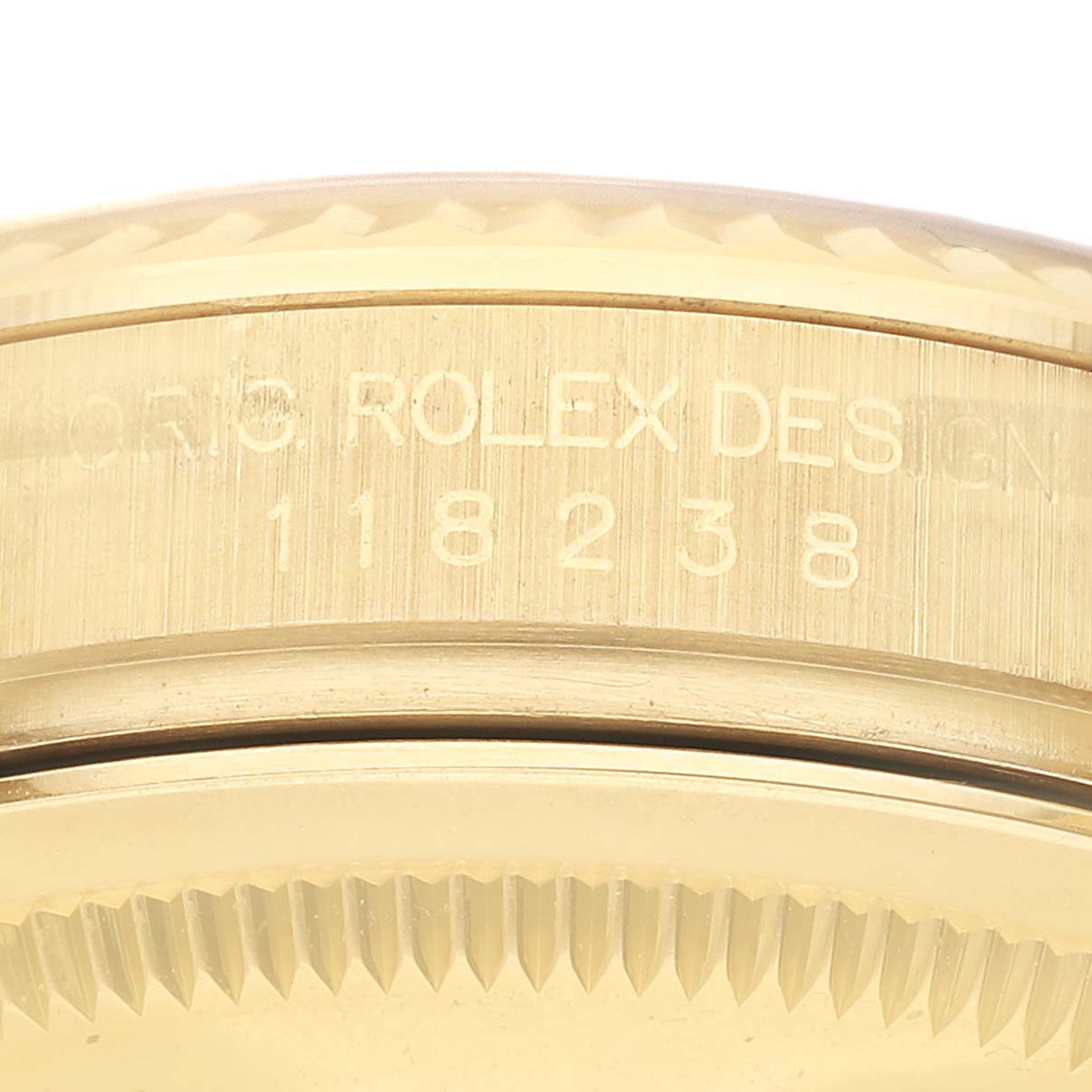 The image shows the side view of a Rolex President 118238 Men's Yellow Gold Champagne Dial watch, focusing on the engraved bezel and case number "118238."