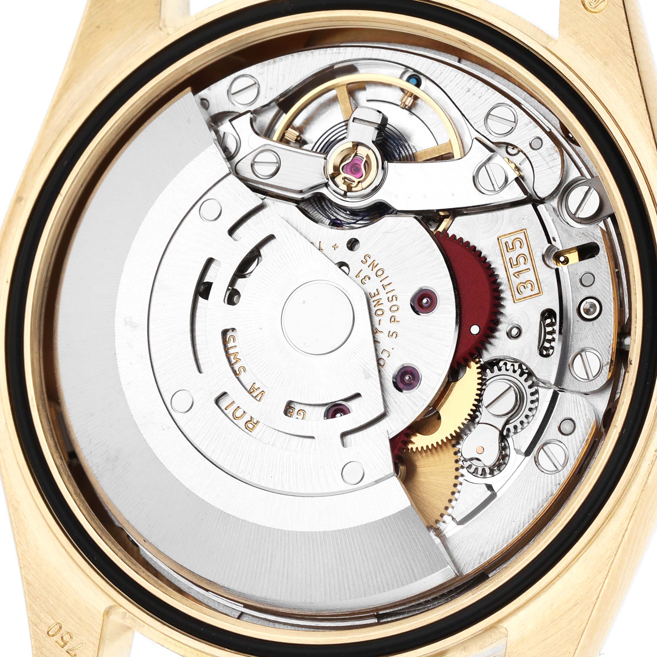 The image displays the movement of a Rolex President 118238 Men's Yellow Gold Champagne Dial watch from a top-down angle, showcasing its intricate mechanics.