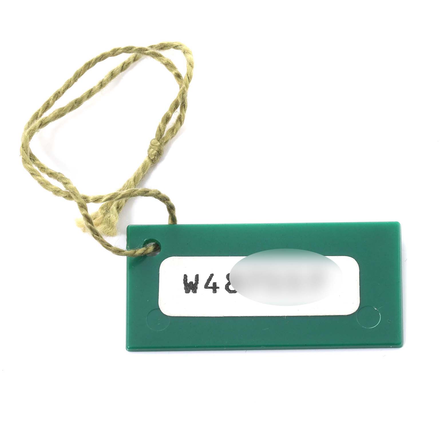 This image shows a green hang tag with a rope string, typically associated with the Rolex President 68278 Women's Yellow Gold Champagne Dial 68278 Women's Yellow Gold Champagne Dial model watch.