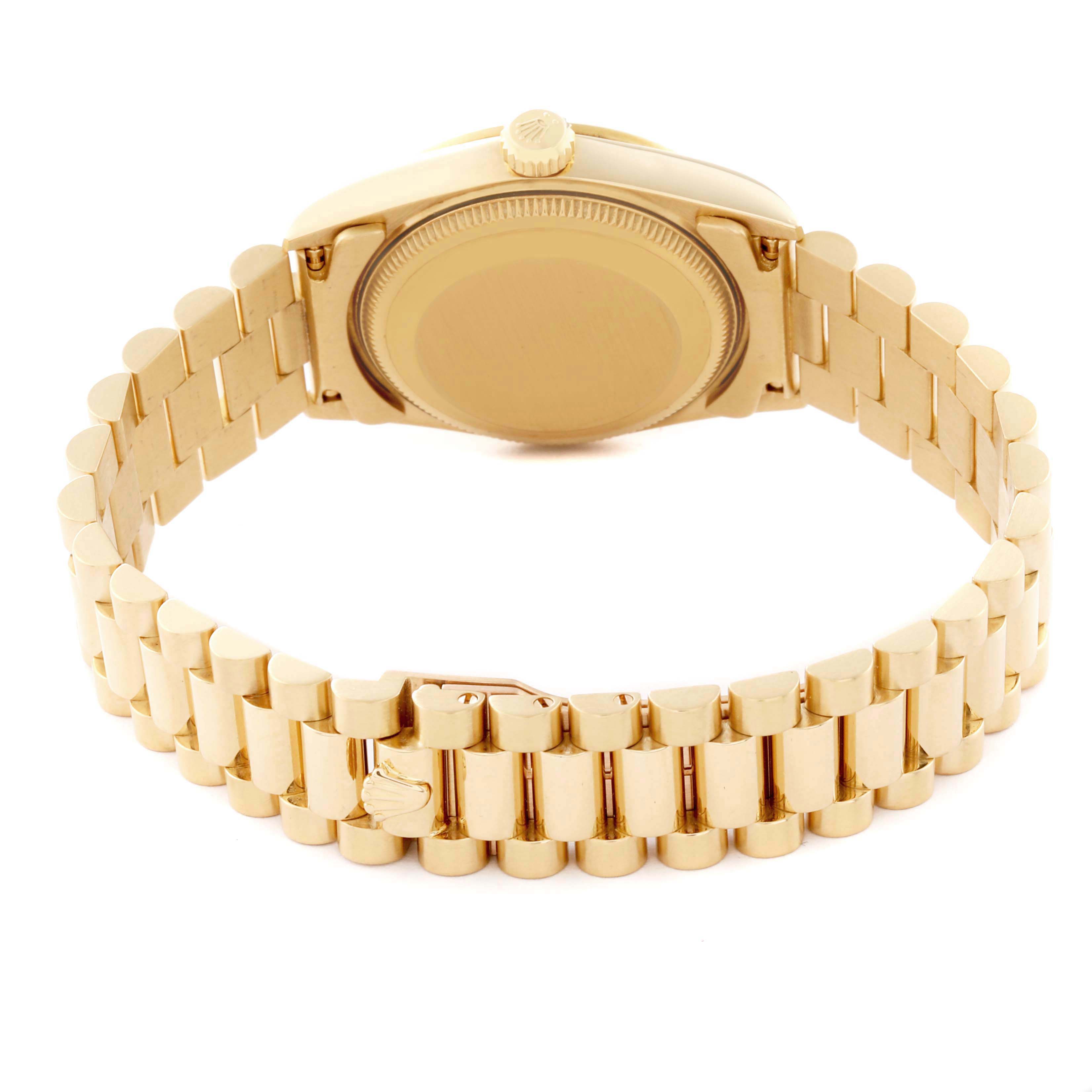 This image shows the rear view of a Rolex President 68278 Women's Yellow Gold Champagne Dial 68278 Women's Yellow Gold Champagne Dial model, displaying the bracelet and case back.