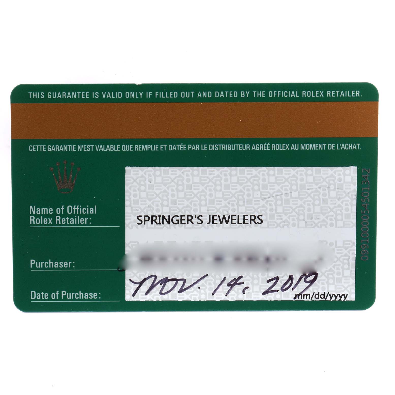 This image shows a green warranty card for a Sea-Dweller model by Rolex, including the retailer
s name and date of purchase.