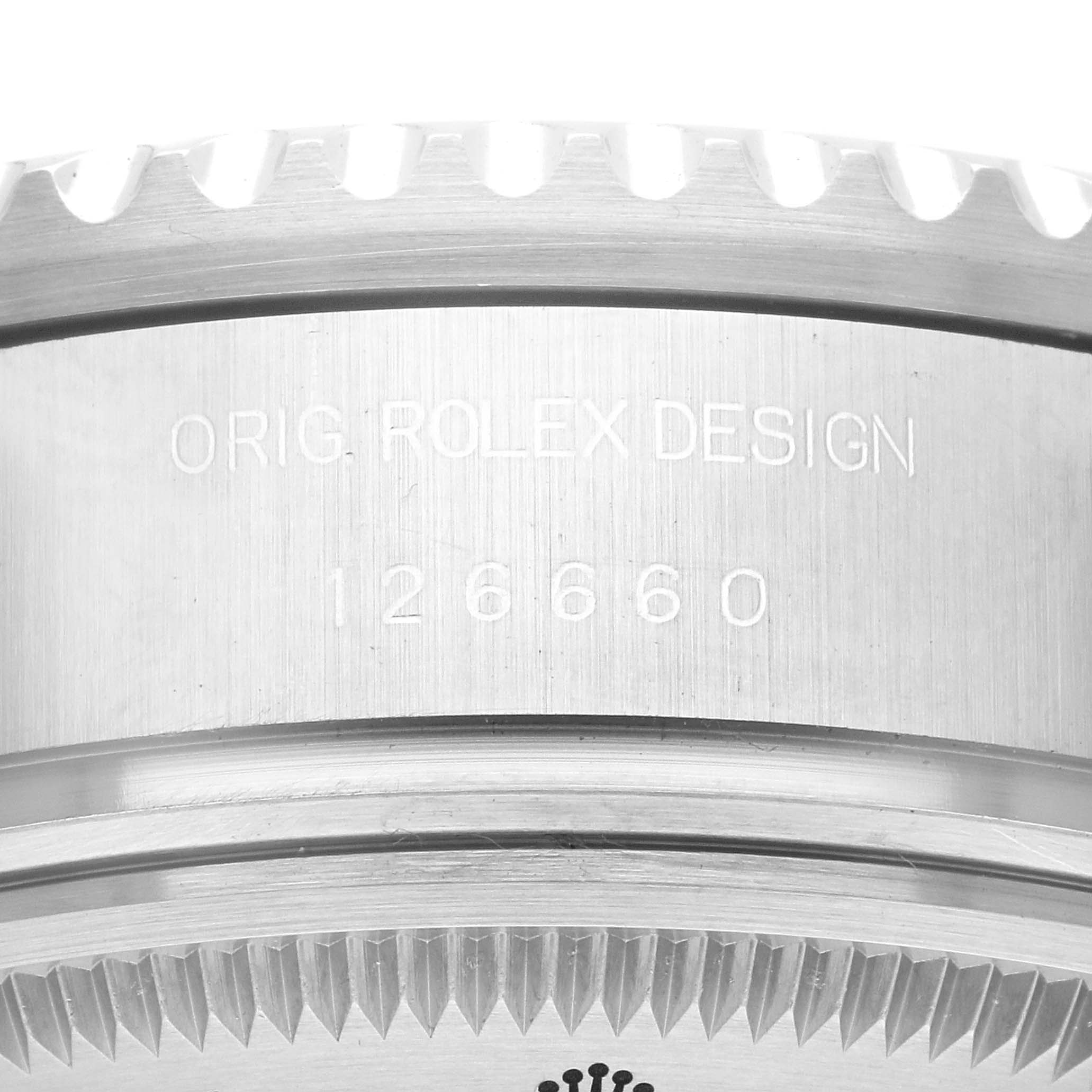 This image shows a close-up of the case side of a Rolex Sea-Dweller 126660 Men
s Stainless Steel Blue Dial 126660 Men
s Stainless Steel Blue Dial, displaying the model number and the engraved text "ORIG ROLEX DESIGN."