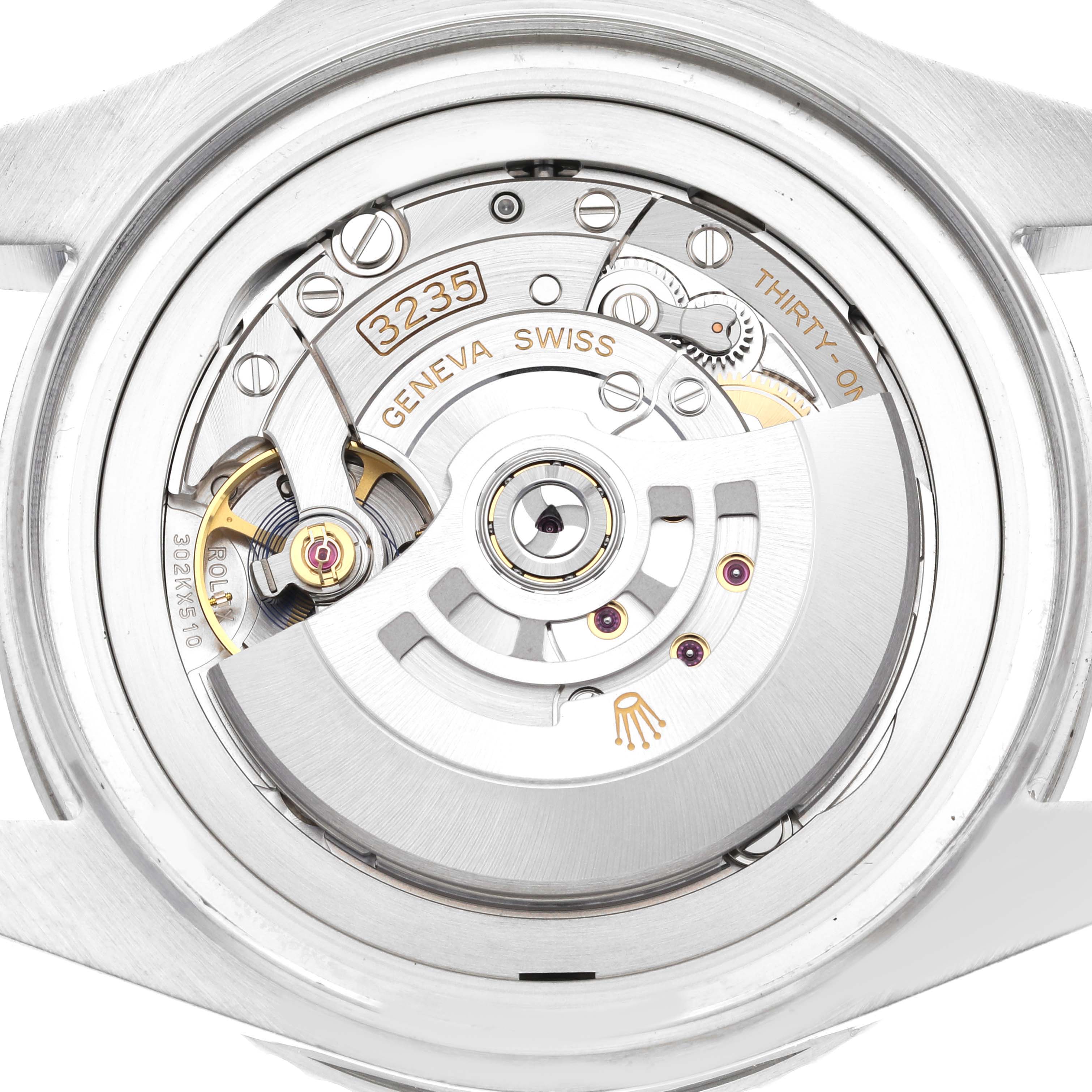 The image shows the back view of a Rolex Sea-Dweller 126660 Men
s Stainless Steel Blue Dial 126660 Men
s Stainless Steel Blue Dial watch, highlighting its intricate movement and inner mechanisms.