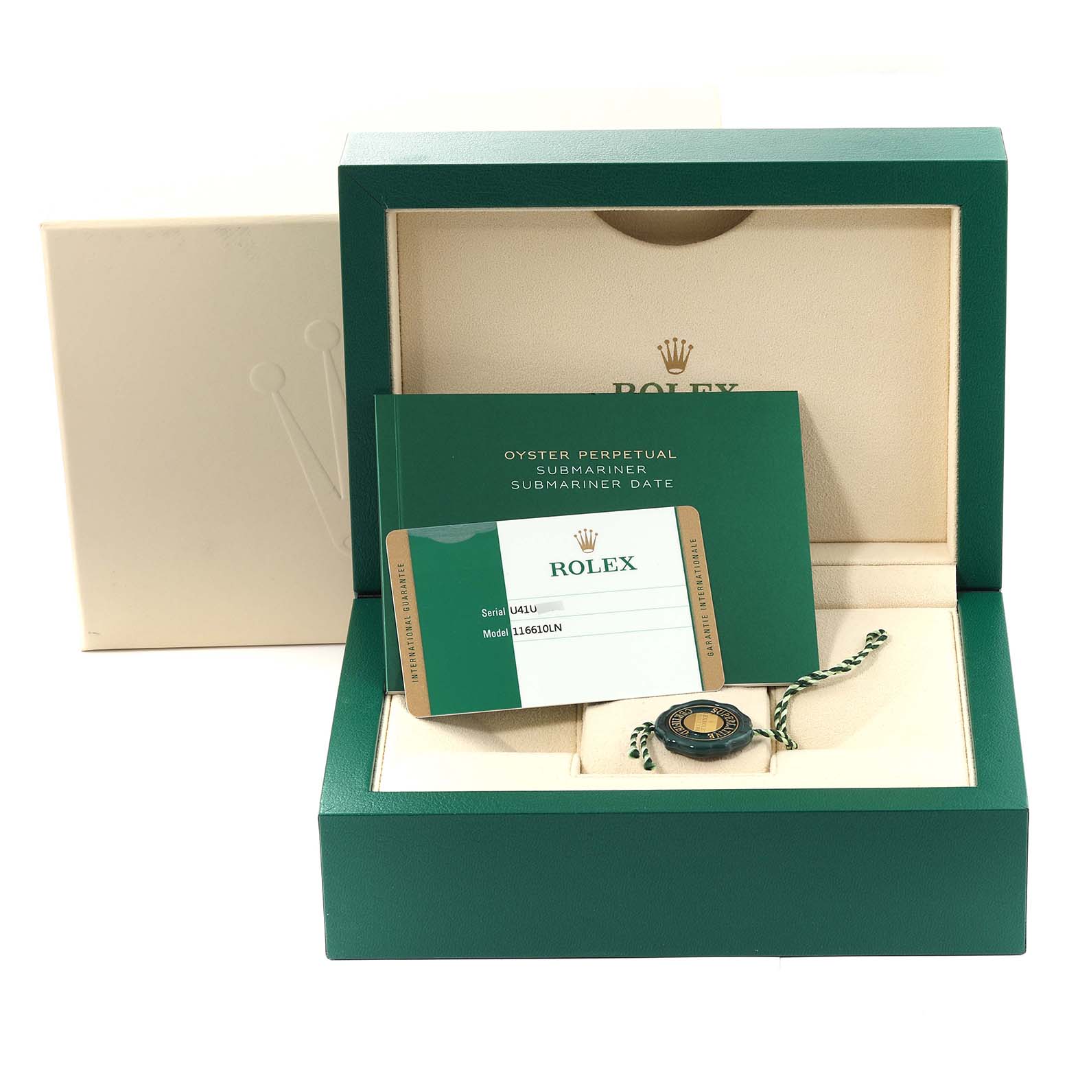 The image shows the packaging and accessories of a Rolex Submariner 116610 Men
s Stainless Steel Black Dial 116610 Men
s Stainless Steel Black Dial watch, including the box, warranty card, and tag.