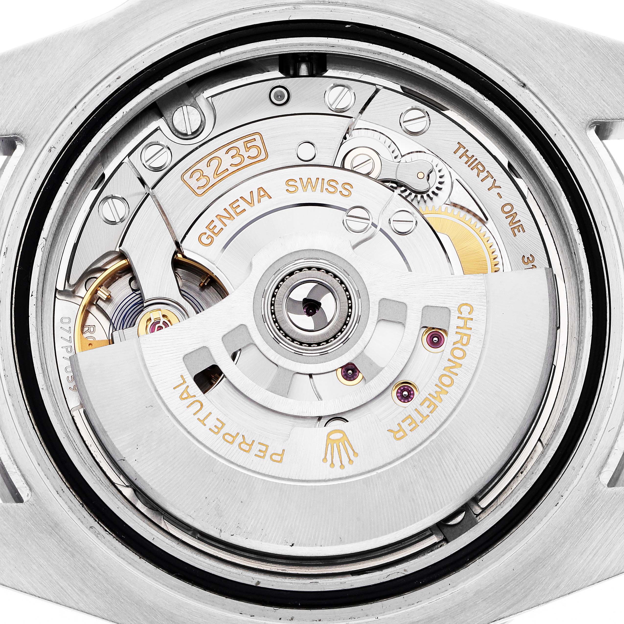 This image shows the movement mechanism of a Rolex Submariner 126610LV Men
s Stainless Steel Black Dial 126610LV Men
s Stainless Steel Black Dial, highlighting its intricate parts from the back.