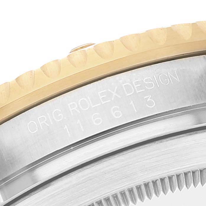 The image shows a close-up of the outer edge of the bezel and case with the model number engraved, from a Rolex Submariner 116613 Men
s Steel and Gold (two tone) Blue Dial 116613 Men
s Steel and Gold (two tone) Blue Dial watch.