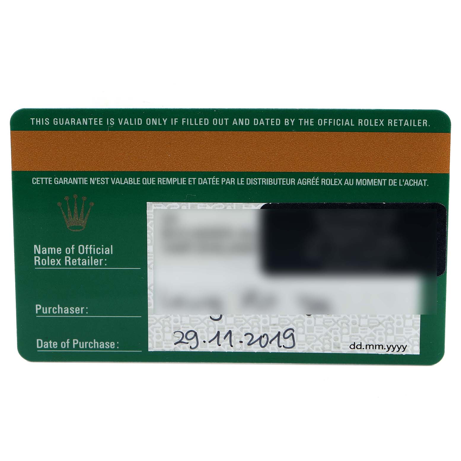 This image shows a guarantee card for the Rolex Submariner 116613 Men
s Steel and Gold (two tone) Blue Dial 116613 Men
s Steel and Gold (two tone) Blue Dial model, including fields for the retailer, purchaser, and date of purchase.