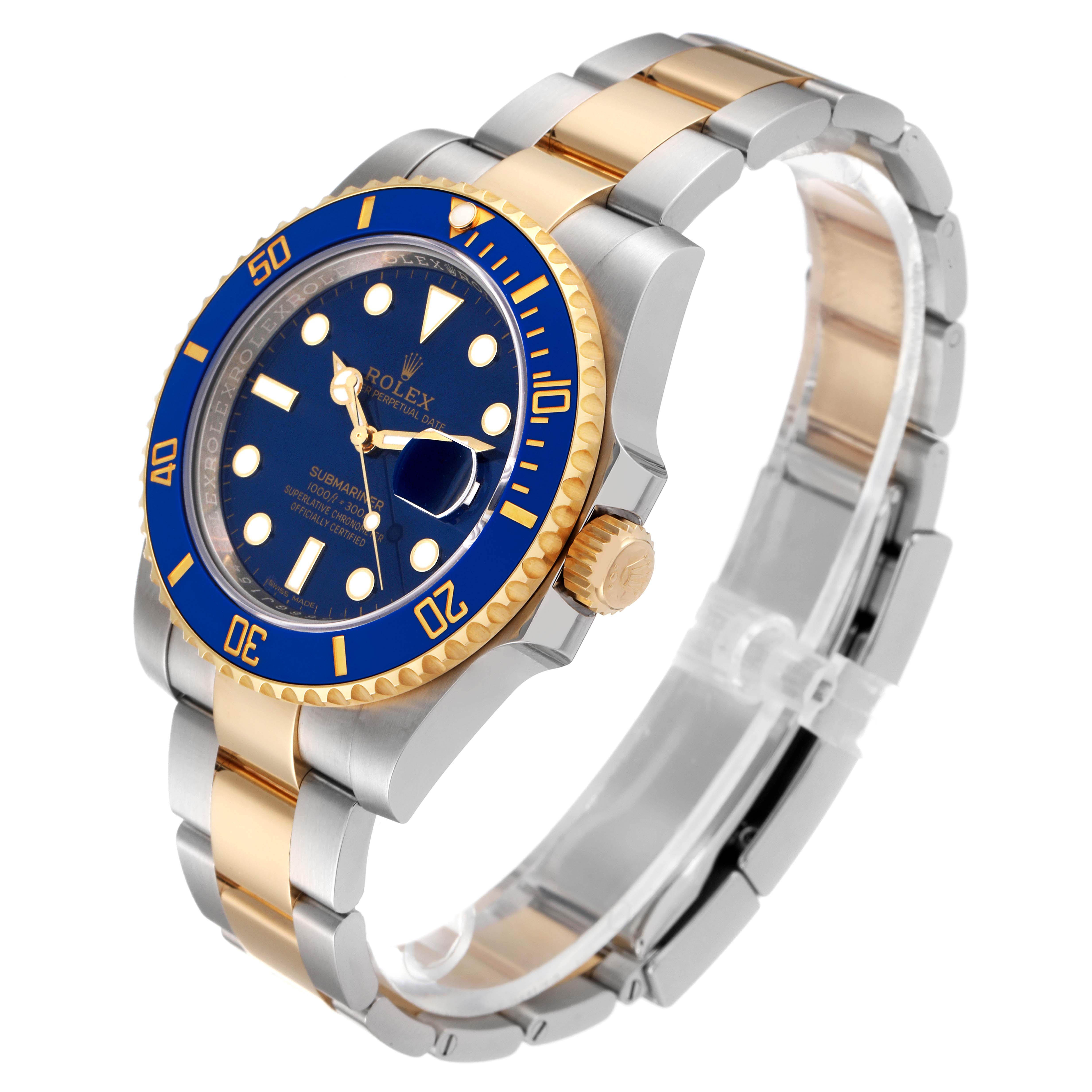 The image shows a Rolex Submariner 116613 Men
s Steel and Gold (two tone) Blue Dial 116613 Men
s Steel and Gold (two tone) Blue Dial watch at a 3/4 angle, highlighting its blue bezel, blue dial, and two-tone bracelet.