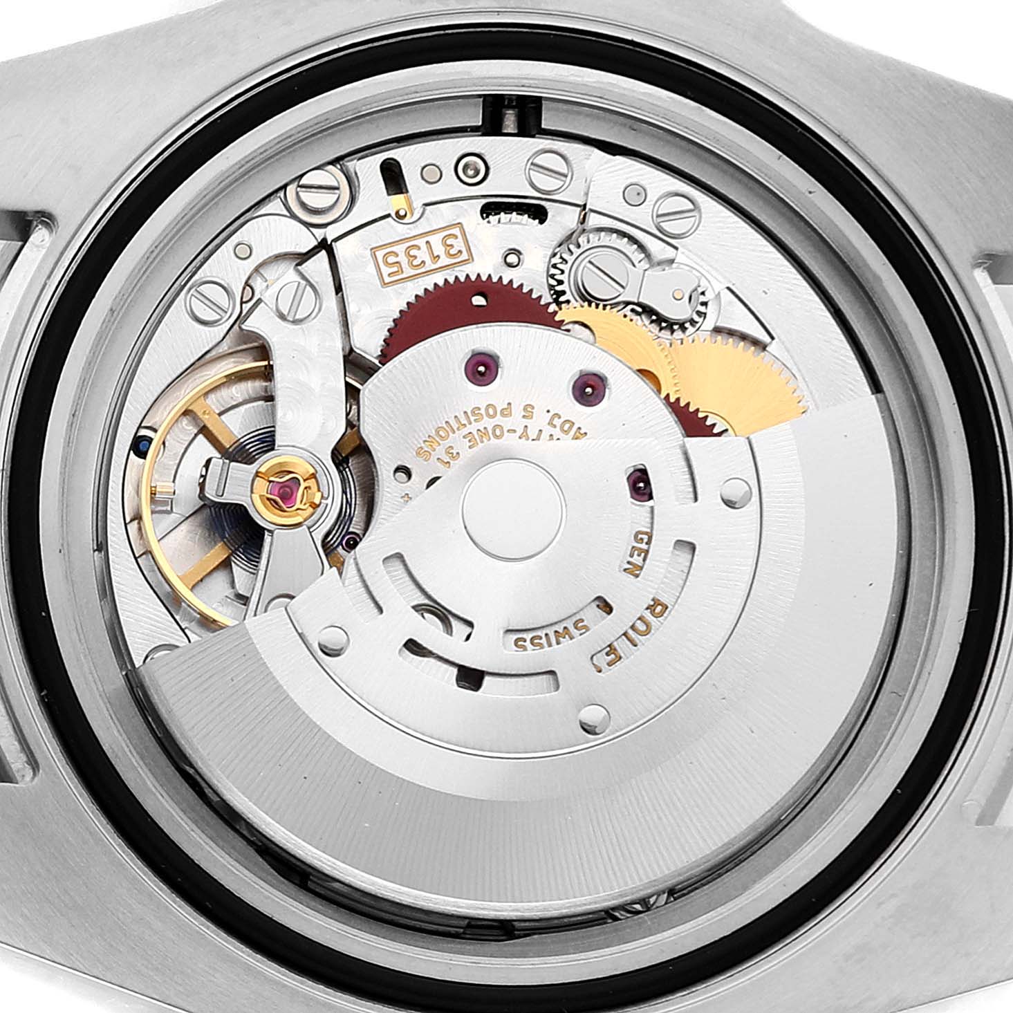 The image shows the movement and internal mechanical components of a Rolex Submariner 116613 Men
s Steel and Gold (two tone) Blue Dial 116613 Men
s Steel and Gold (two tone) Blue Dial watch from a rear angle.