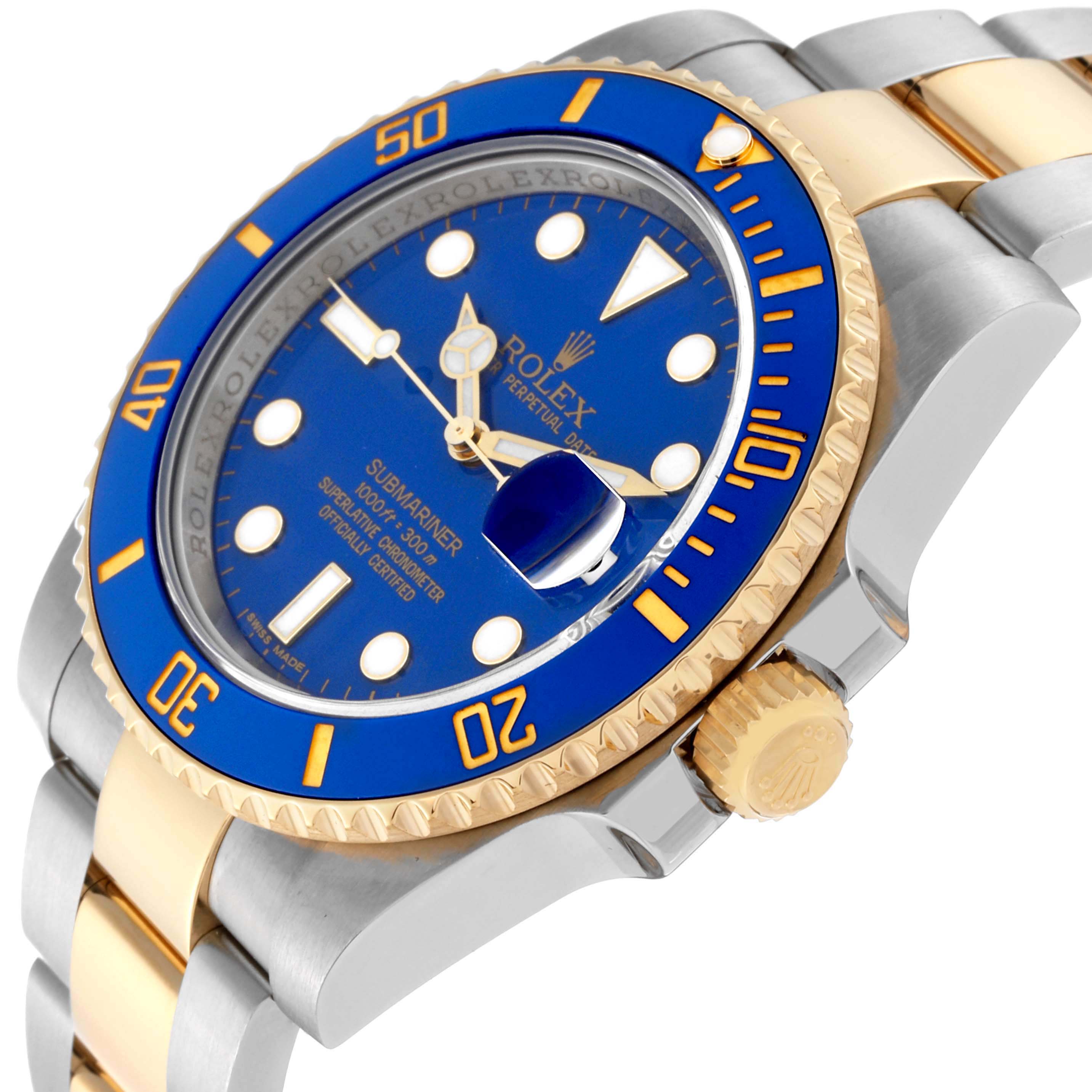 The image shows a close-up angled view of a Rolex Submariner 116613 Men's Steel and Gold (two tone) Blue Dial 116613 Men's Steel and Gold (two tone) Blue Dial watch, highlighting the blue dial, bezel, and two-tone bracelet.