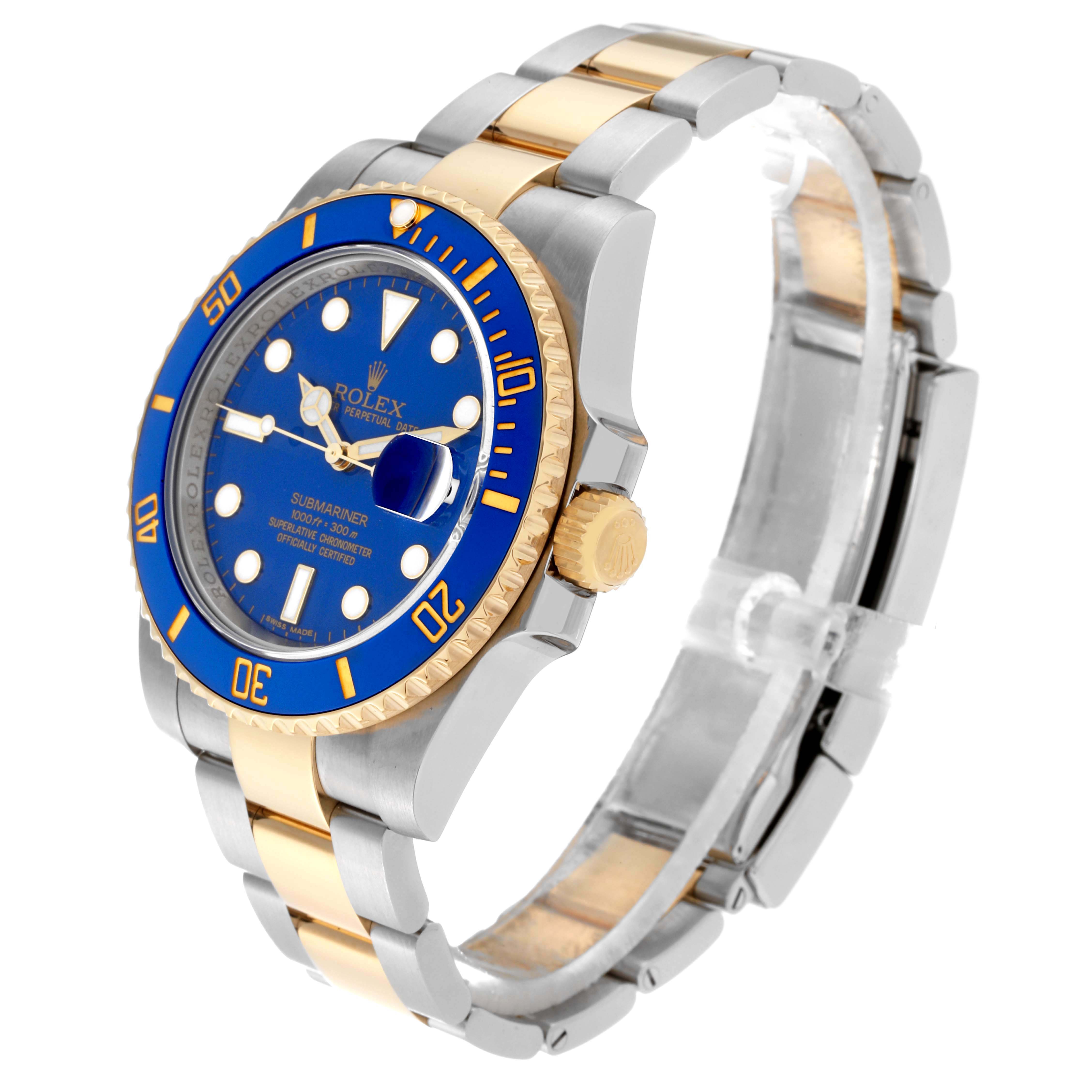 The image shows a Rolex Submariner 116613 Men's Steel and Gold (two tone) Blue Dial 116613 Men's Steel and Gold (two tone) Blue Dial watch at a three-quarter angle, highlighting the blue dial, bezel, and two-tone bracelet.