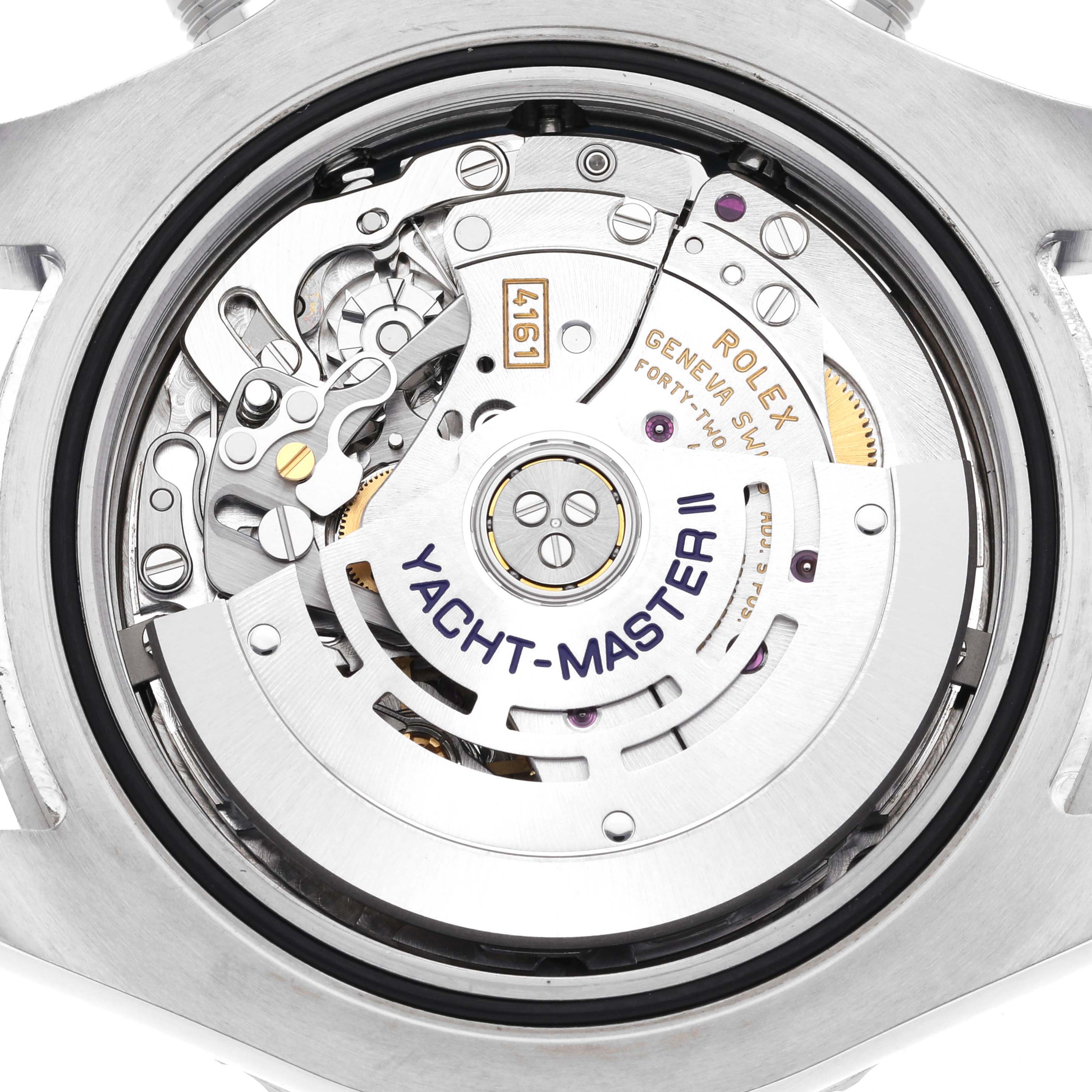 The image shows the back view of the Rolex Yacht-Master 116680 Men's Stainless Steel White Dial watch, highlighting its intricate movement mechanism.