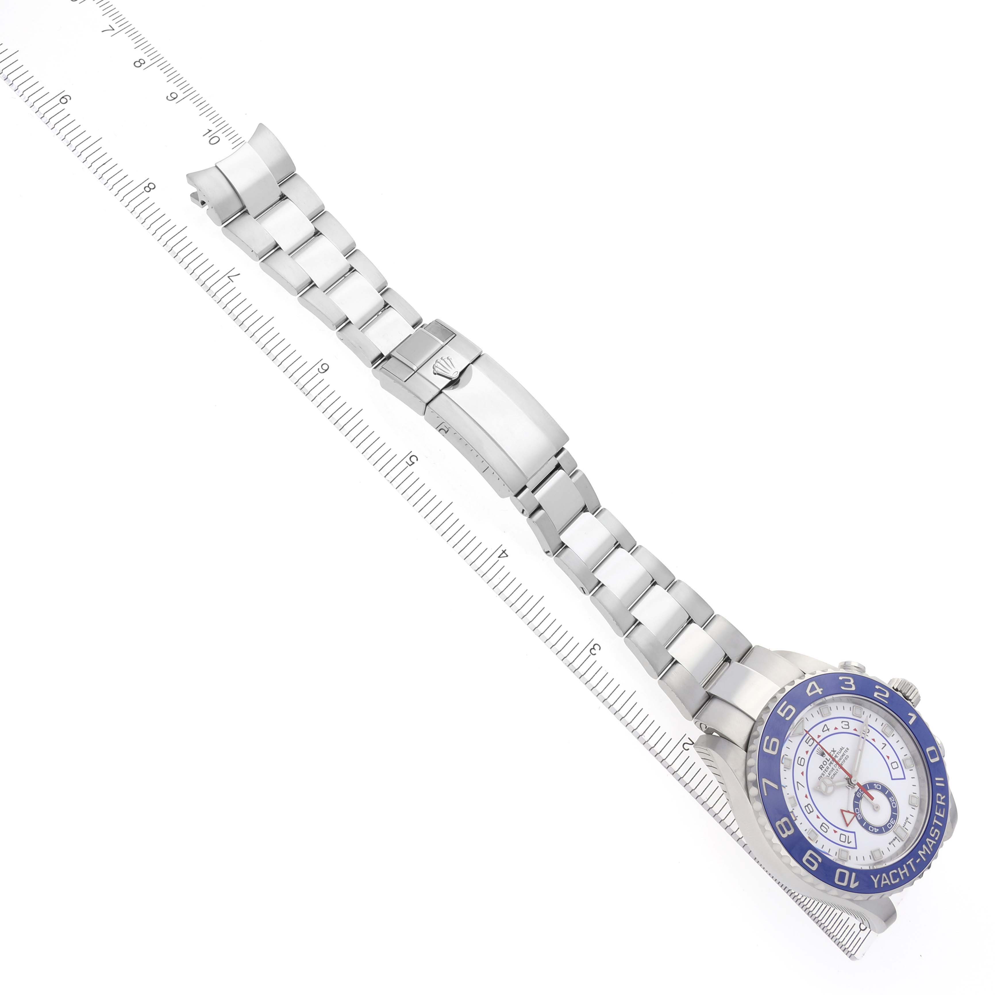 The Rolex Yacht-Master 116680 Men's Stainless Steel White Dial watch is shown from a top-down angle, highlighting the face, bracelet, and clasp.
